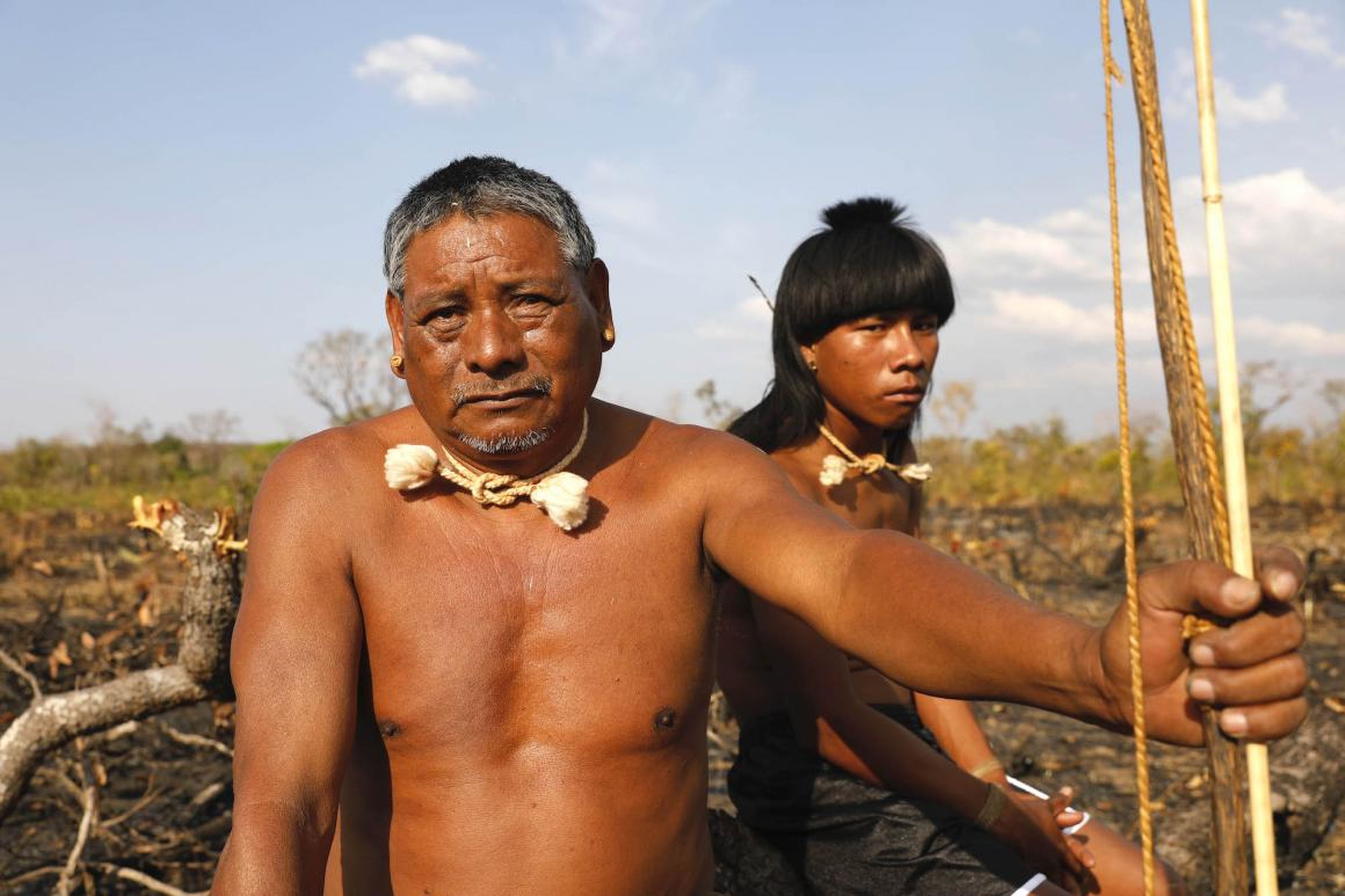 In front sits Chief Hector, 53. They are part of the Xavante tribe. In total, there are about 20,000 Xavante people across Brazil. They live in a tribe of around 100.