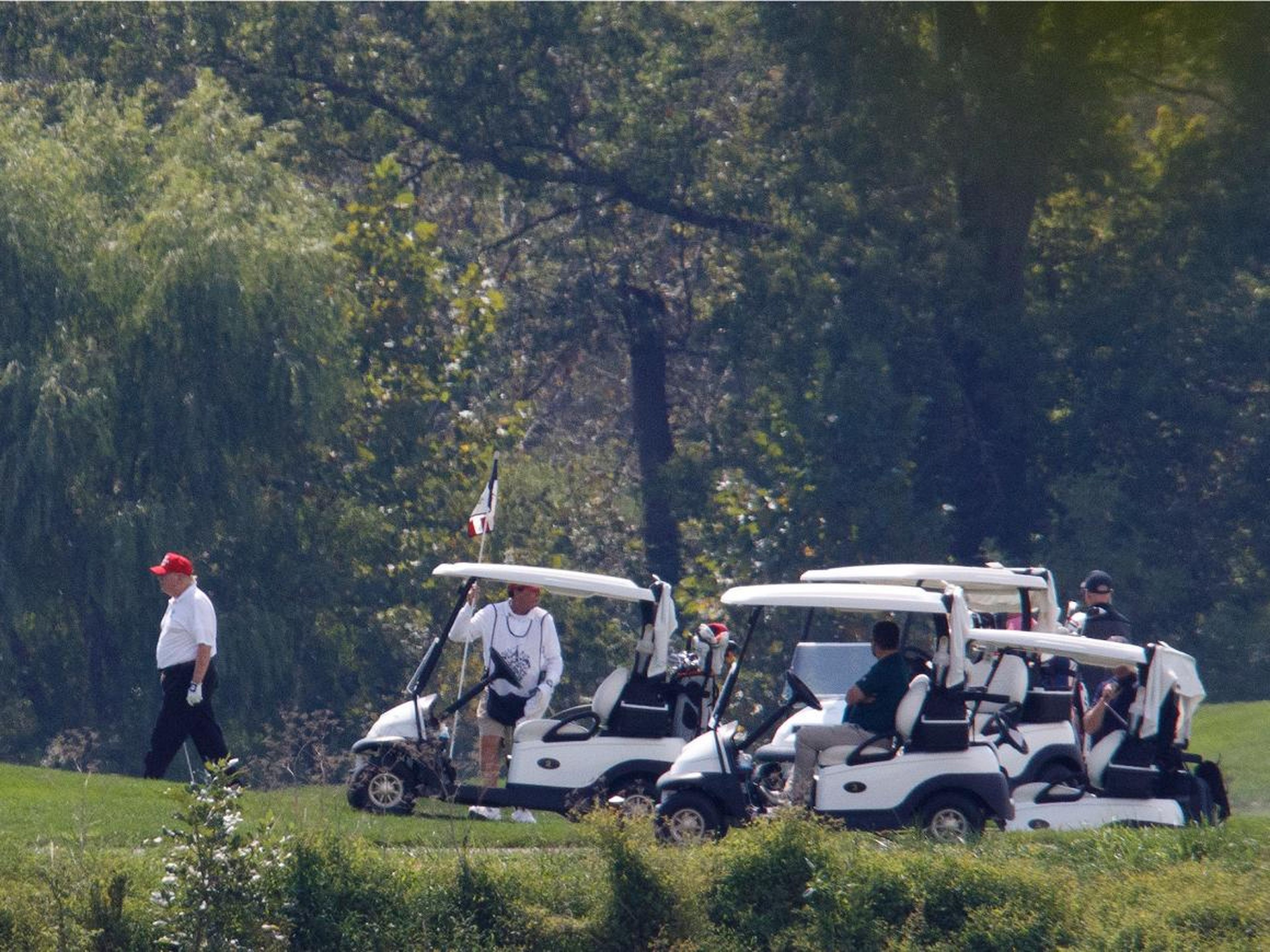 Trump playing golf in Sterling, Virginia.