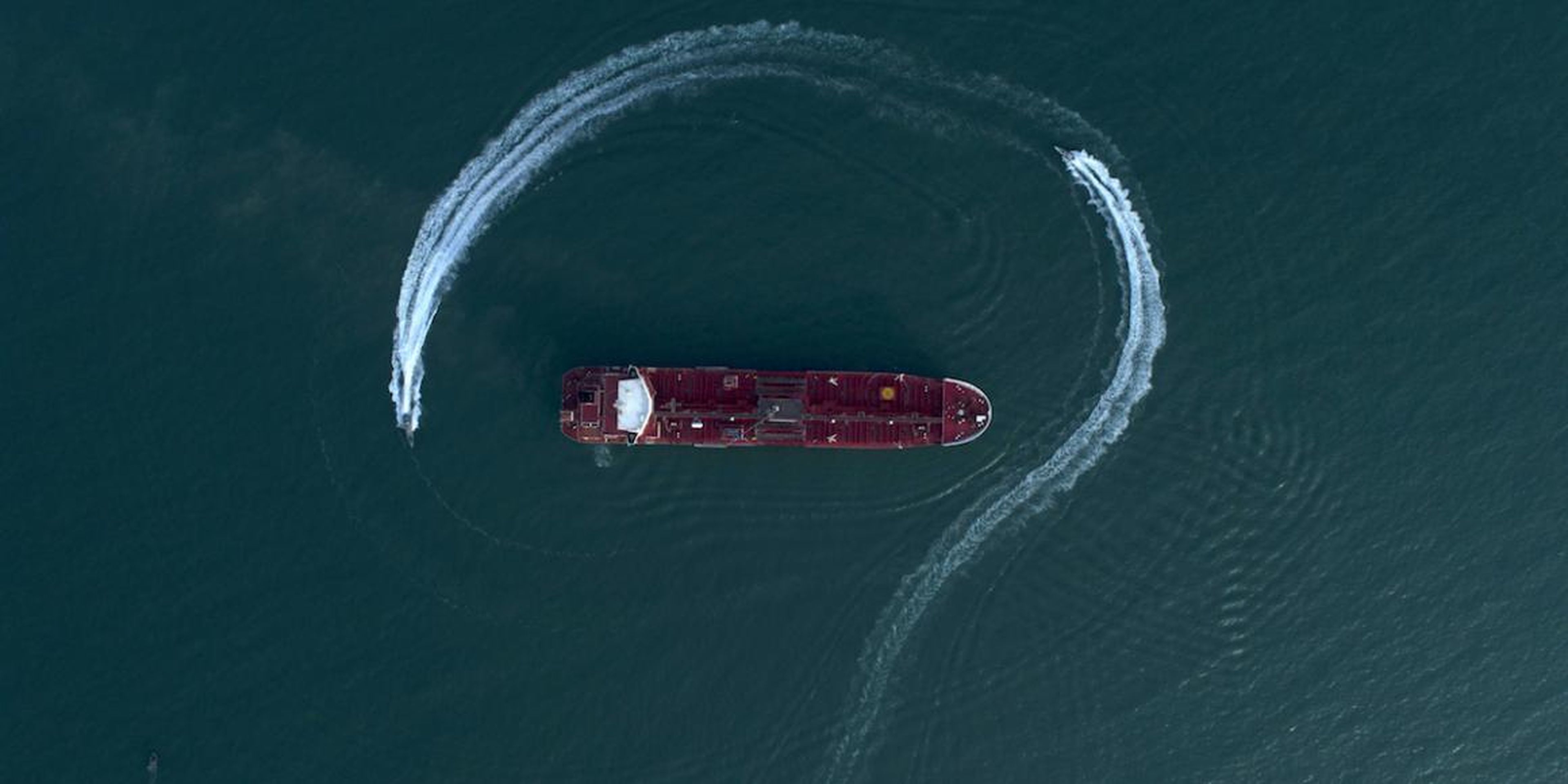 IRGC speedboats circle around the British-flagged Stena Impero oil tanker in the Strait of Hormuz on July 21, 2019.
