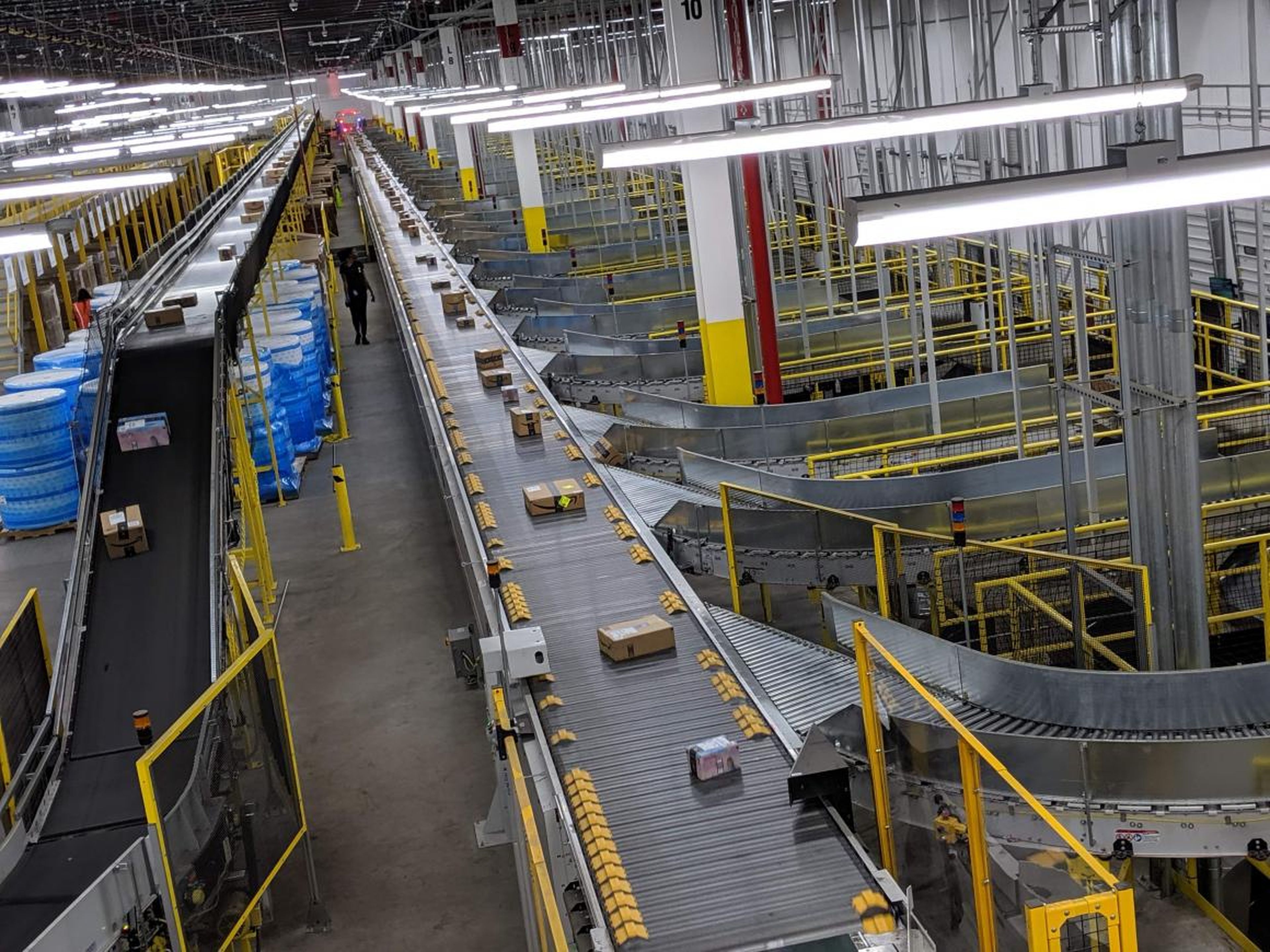 The shipping area seen here was one of the most immediately impressive parts of the facility. Packages are automatically whisked from the conveyor belt to different chutes solely by the metal slats moving from left to right (the