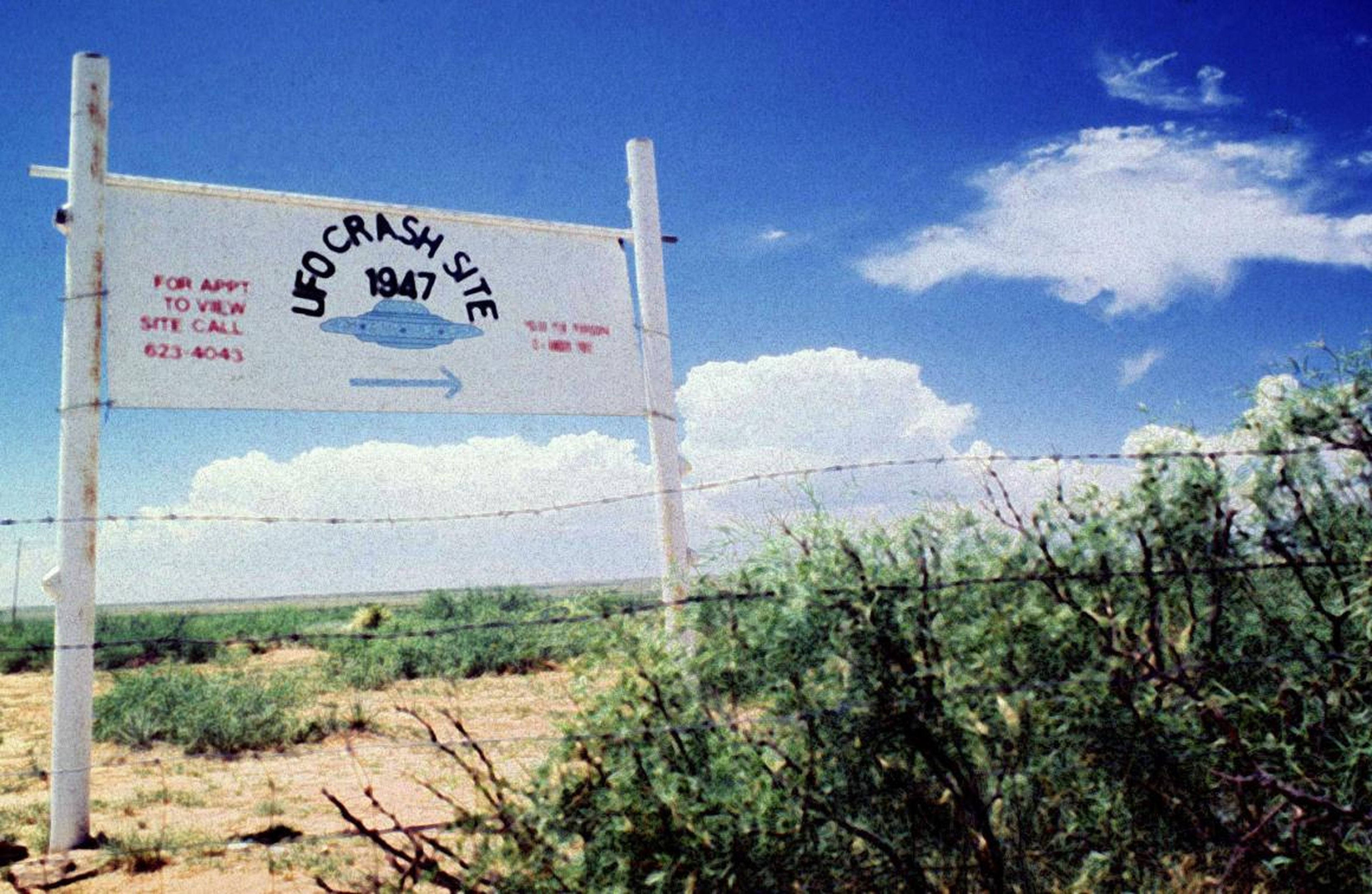 A sign north of Roswell, New Mexico, points west to the 1947 crash site.