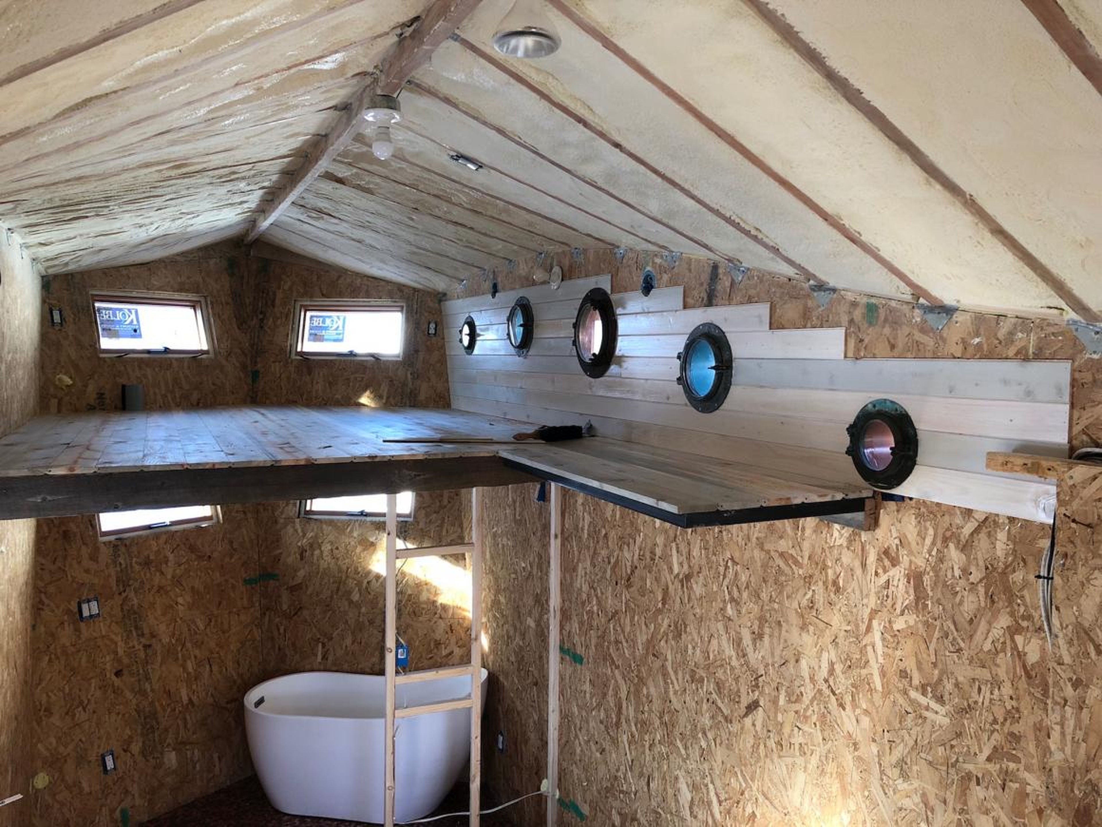 "Because we are a highly custom builder working on 'untested' designs, small conflicts are inevitable, such as the toilet lining up over a structural steel member in the trailer chassis, or the laundry box falling over the wheel