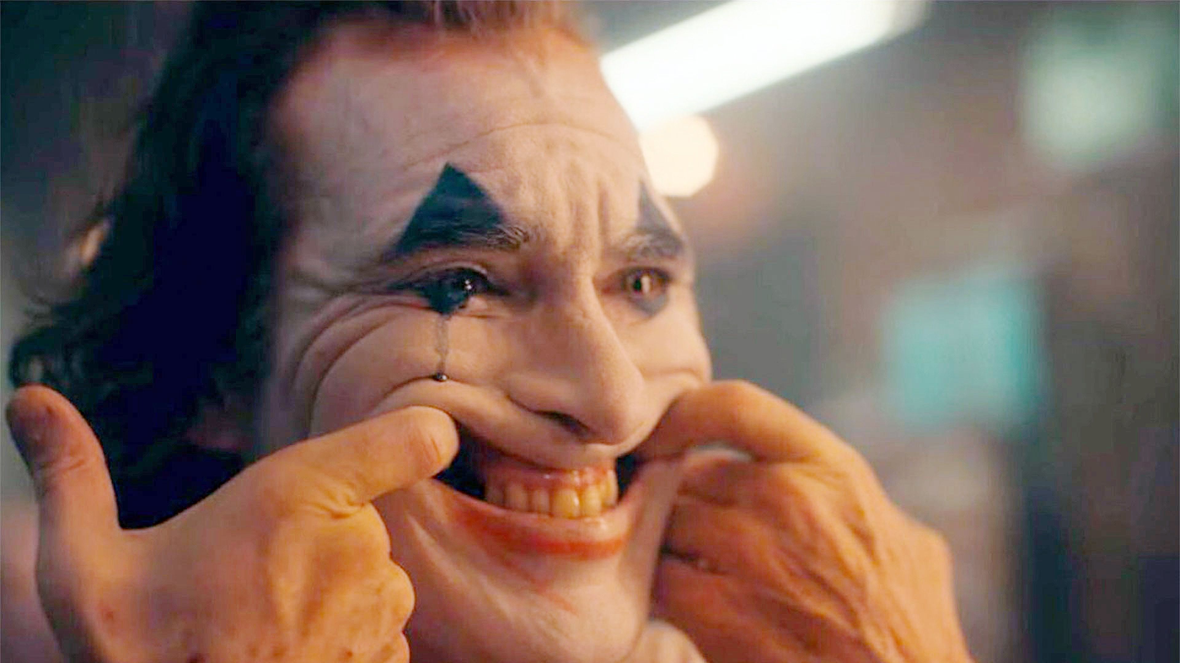 Joaquin Phoenix interpretando al Joker.