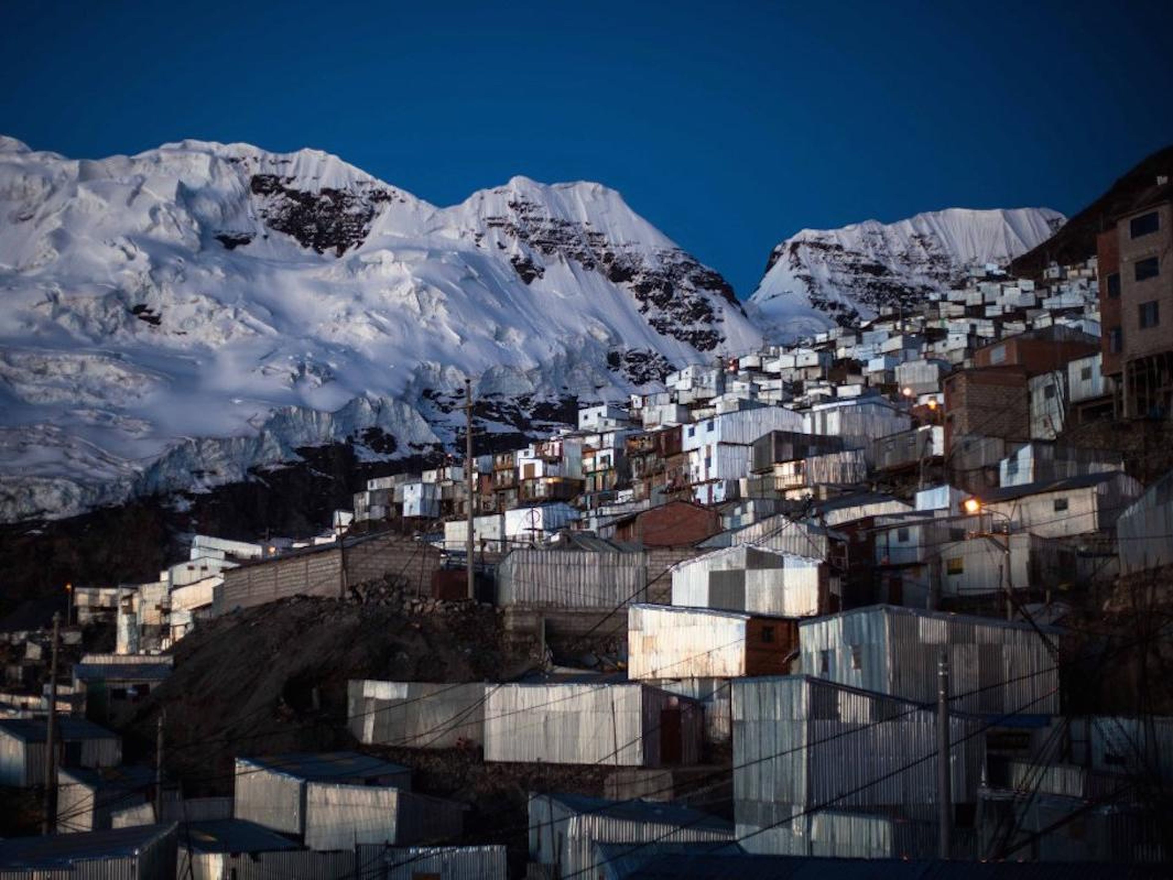 The settlement was built at an astonishing height of 16,700 feet and lies in the shadow of Bella Durmiente — or Sleeping Beauty — an enormous glacier that lurks over the town.
