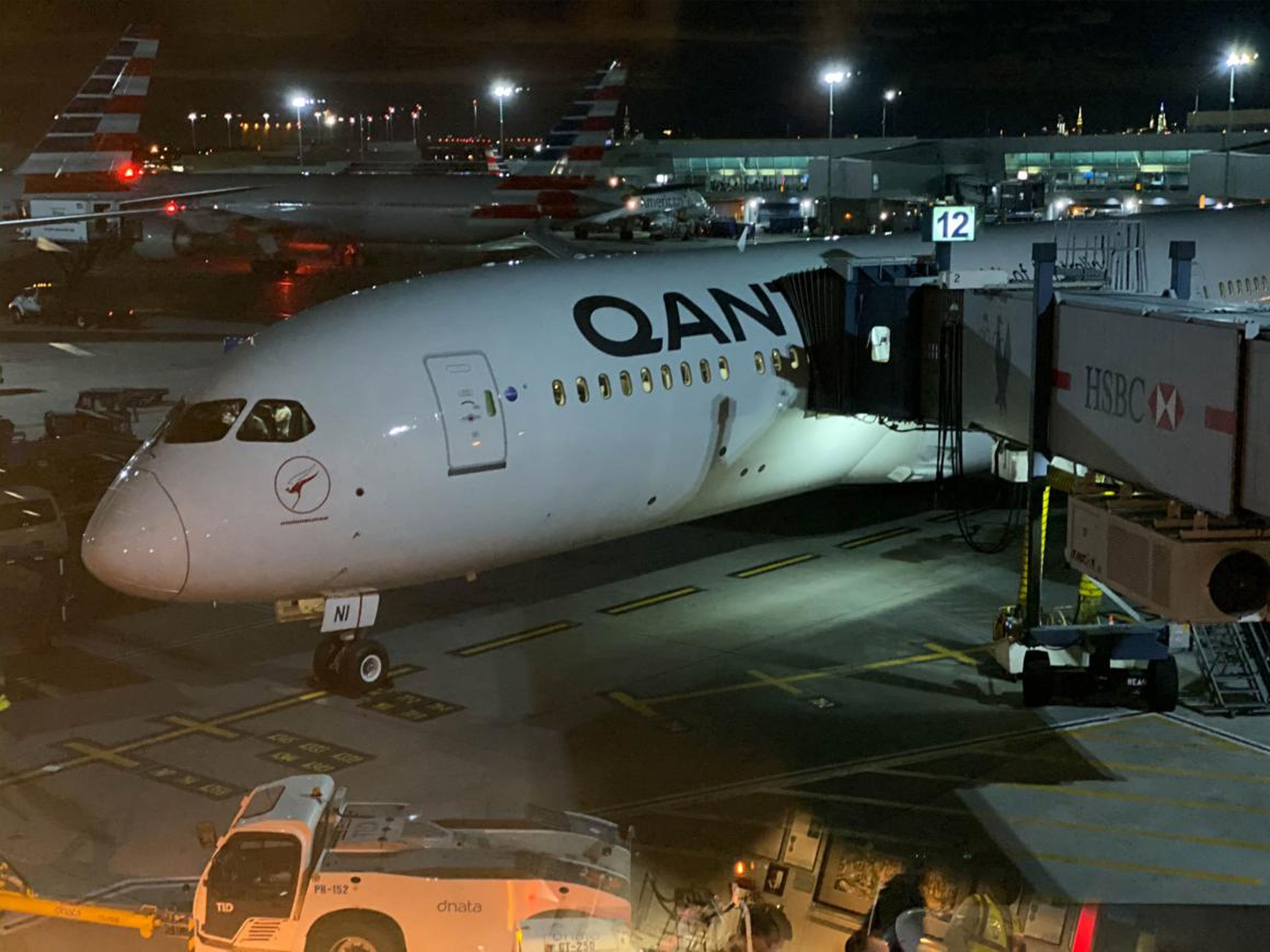 Soon enough, we went down to Gate 12 and got the first glimpse of our home for the next day: a brand-new Boeing 787-9, registration VH-ZNI, delivered to Qantas from Boeing's factory in Seattle just a few days before.