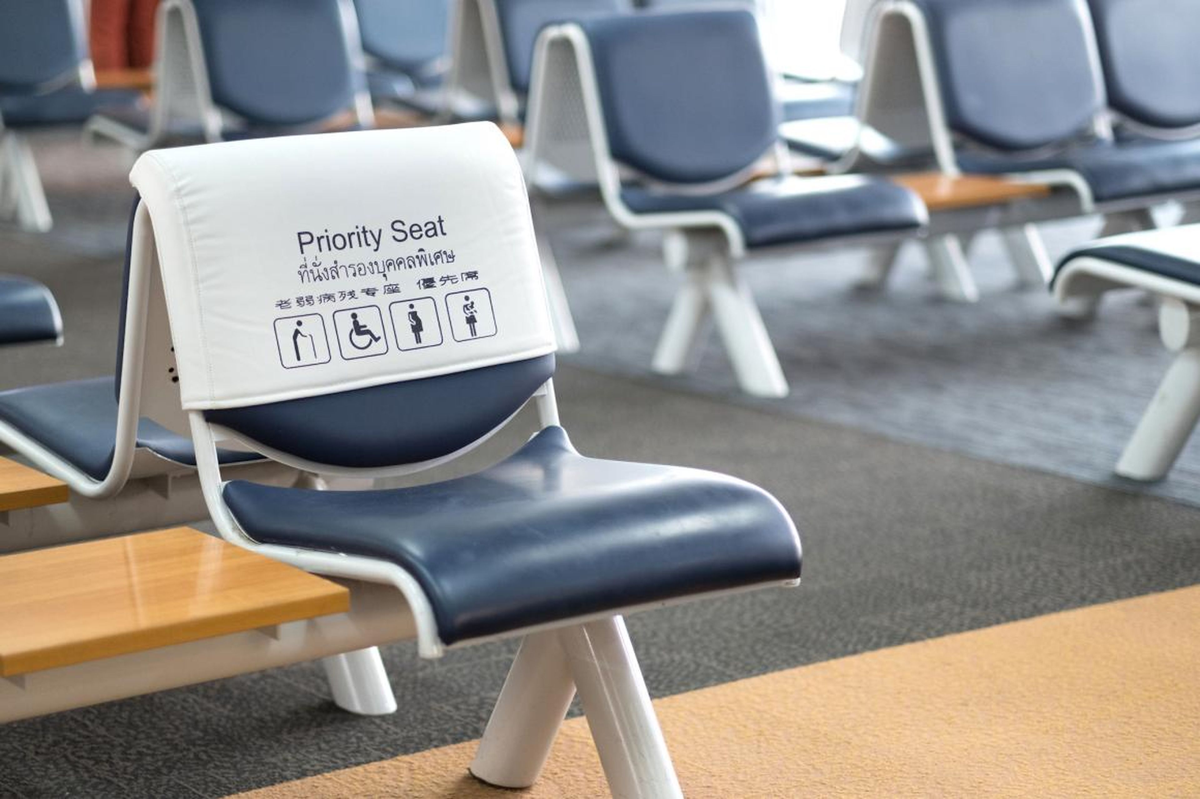 A priority seat for elderly, disabled, or pregnant people in an airport.