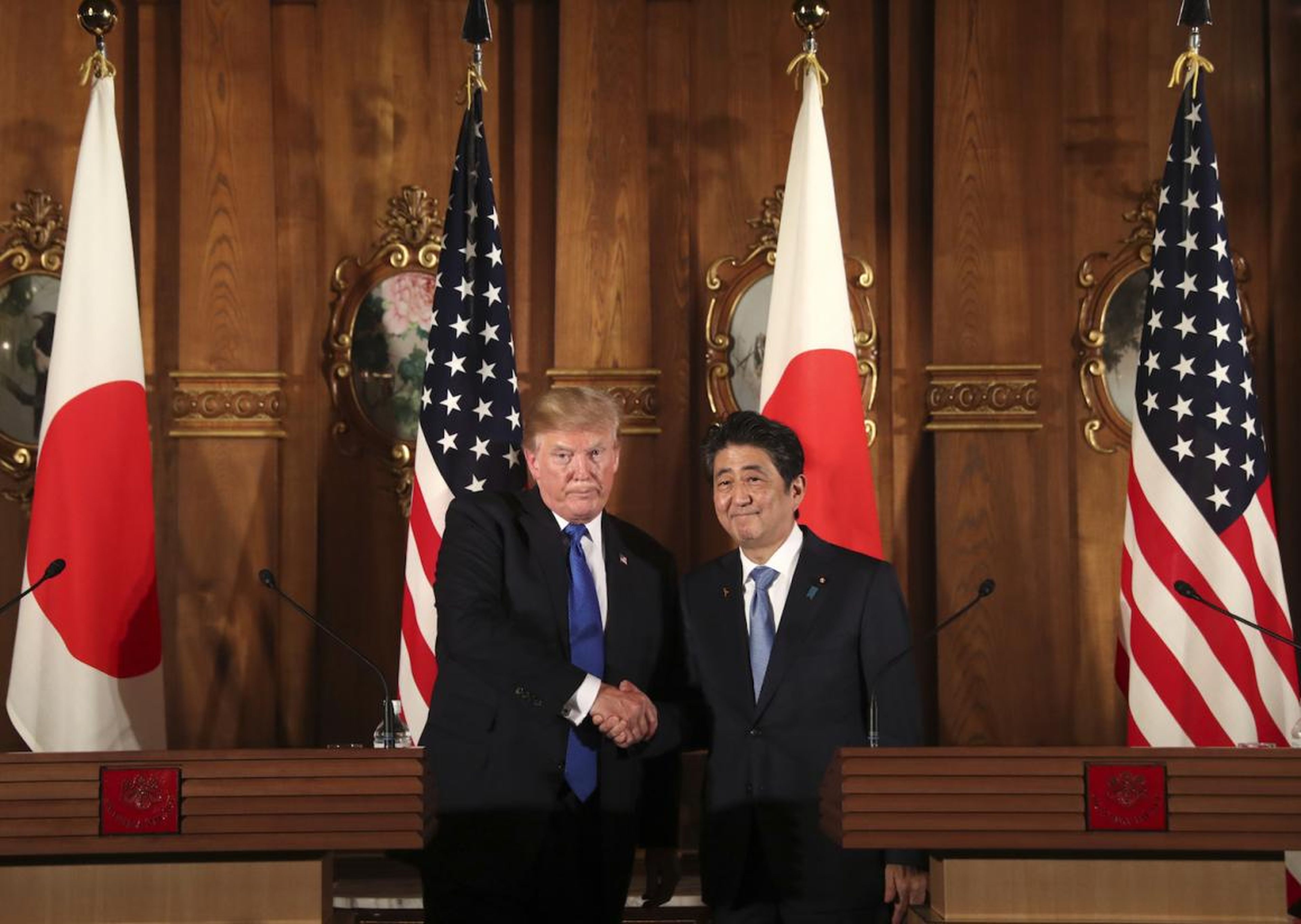 Trump signs trade deal with Japan as tensions escalate with China and the EU