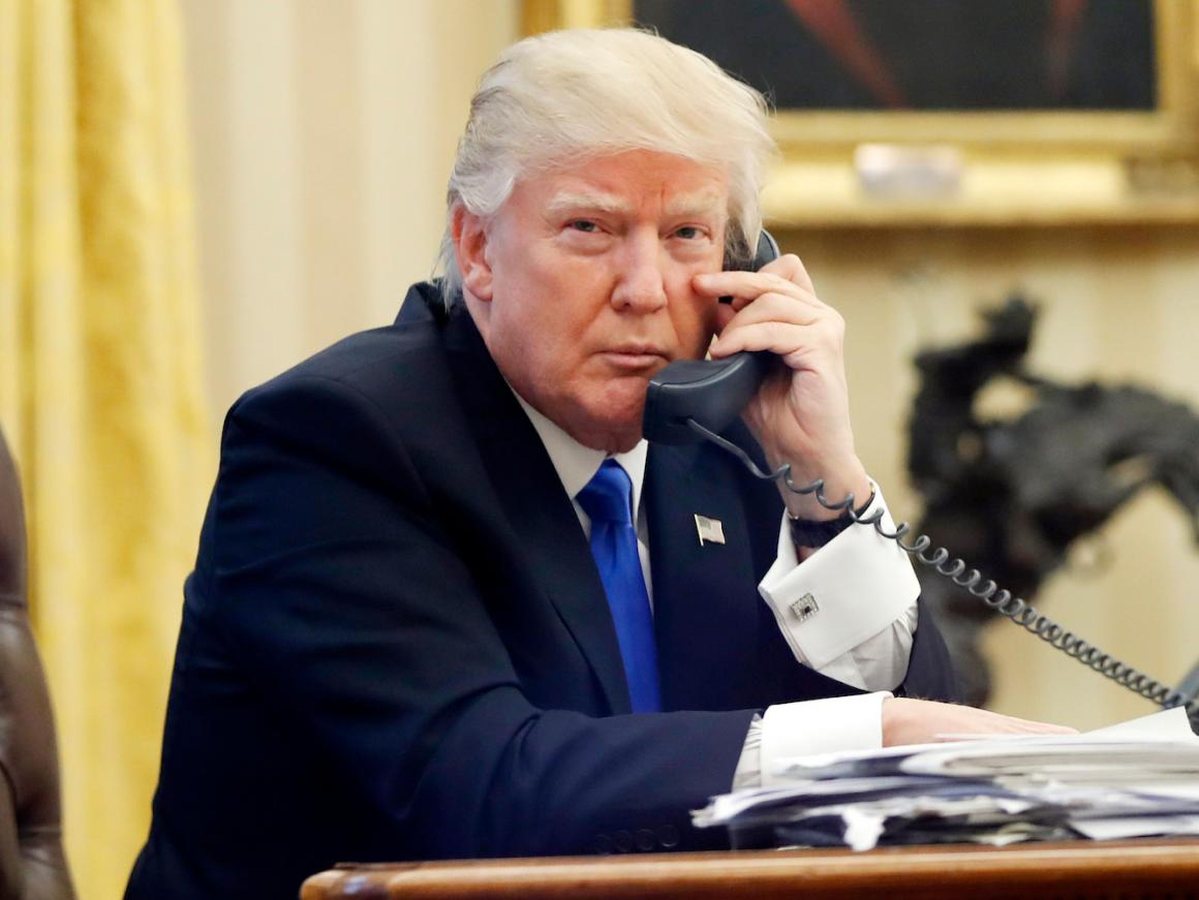 President Donald Trump on the phone in the White House Oval Office in July 2017.
