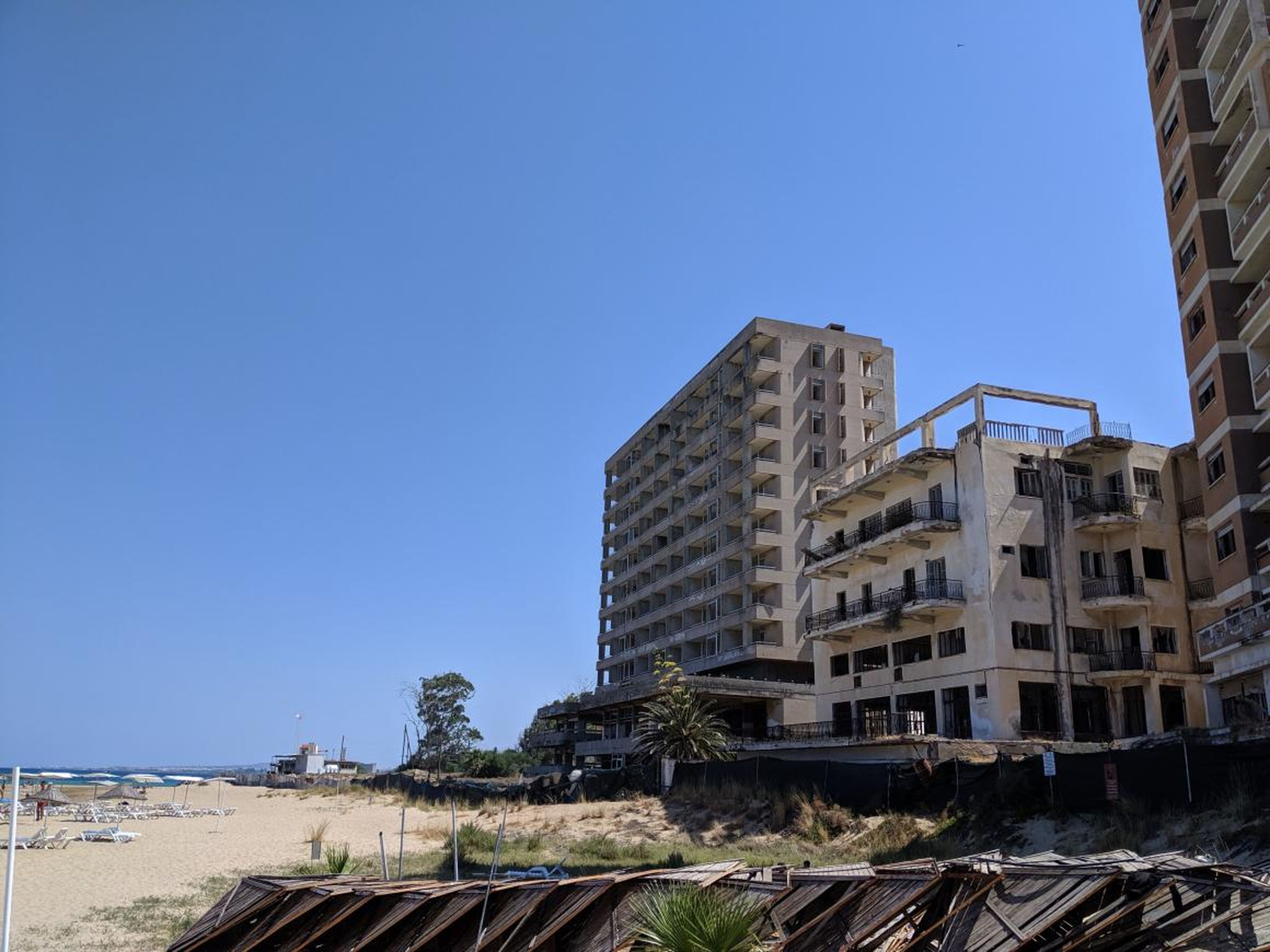 Once popular tourist destinations, these beach side hotels are now vacant.