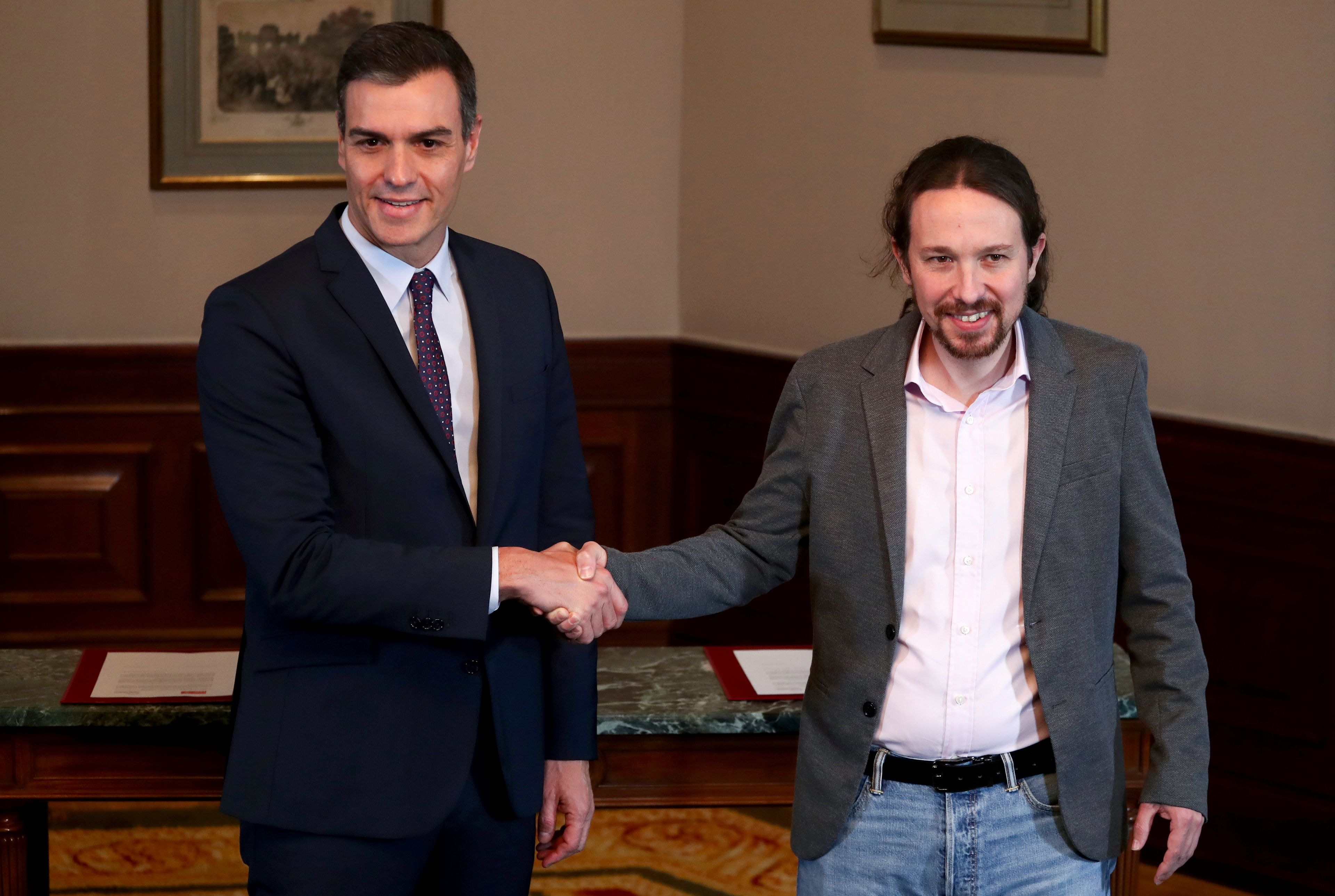 Pedro Sánchez y Pablo Iglesias, tras anunciar su preacuerdo para un gobierno de coalición.