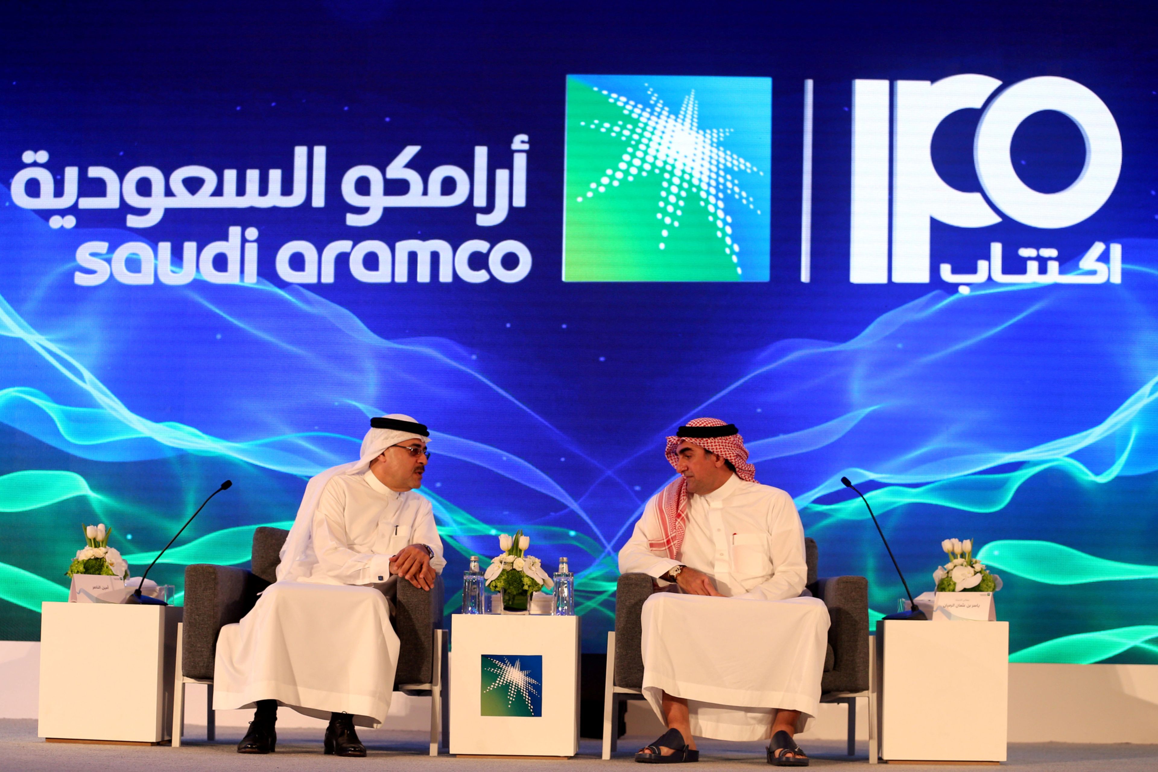 El presidente y CEO de Saudi Aramco, Amin Nasser, y el director de la petrolera, Yasser al-Rumayyan