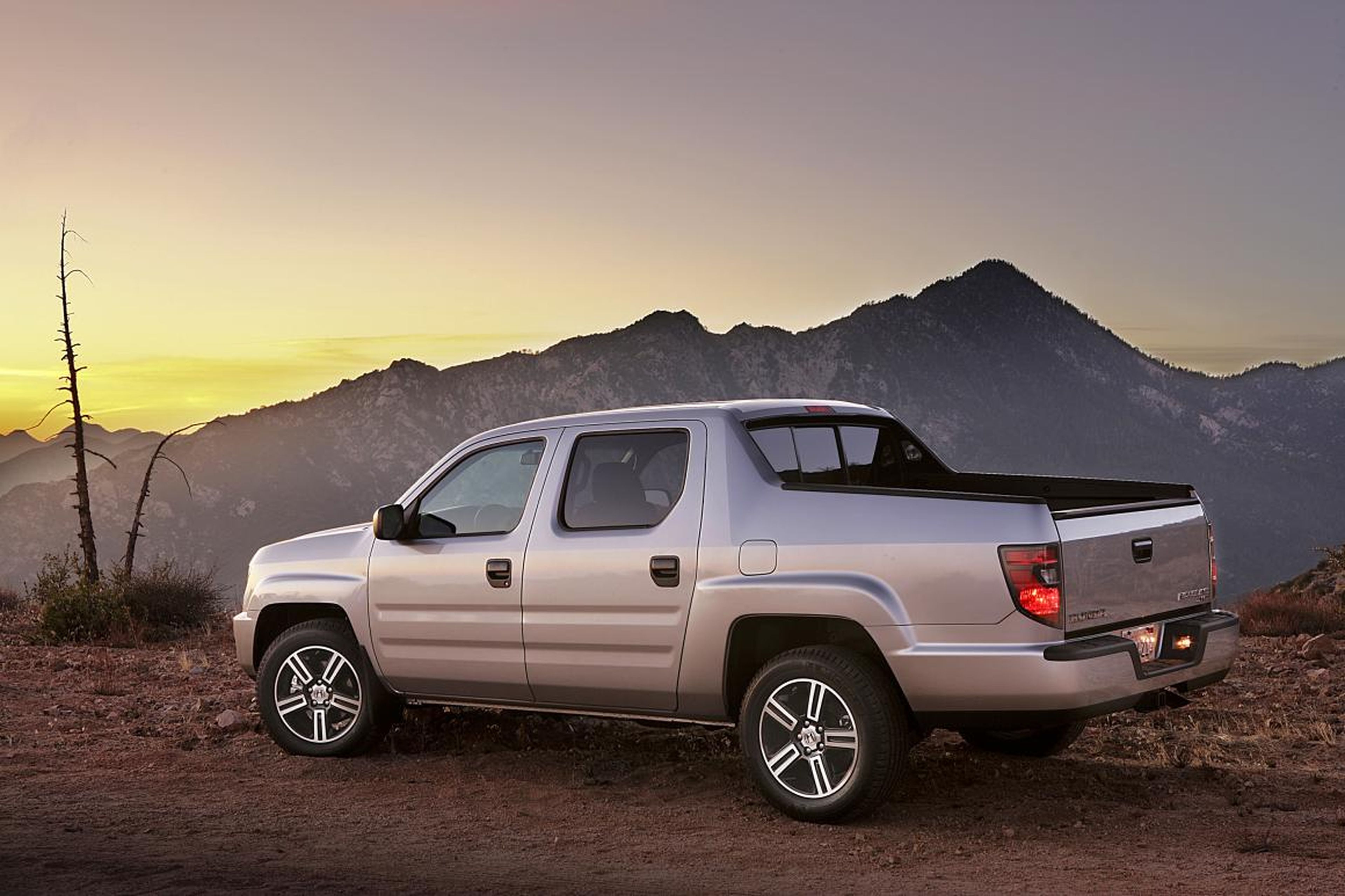 In the realm of actual pickup trucks, the Cybertruck's high sides for its bed are reminiscent of the first-generation Honda Ridgeline. These are called "sail pillars."