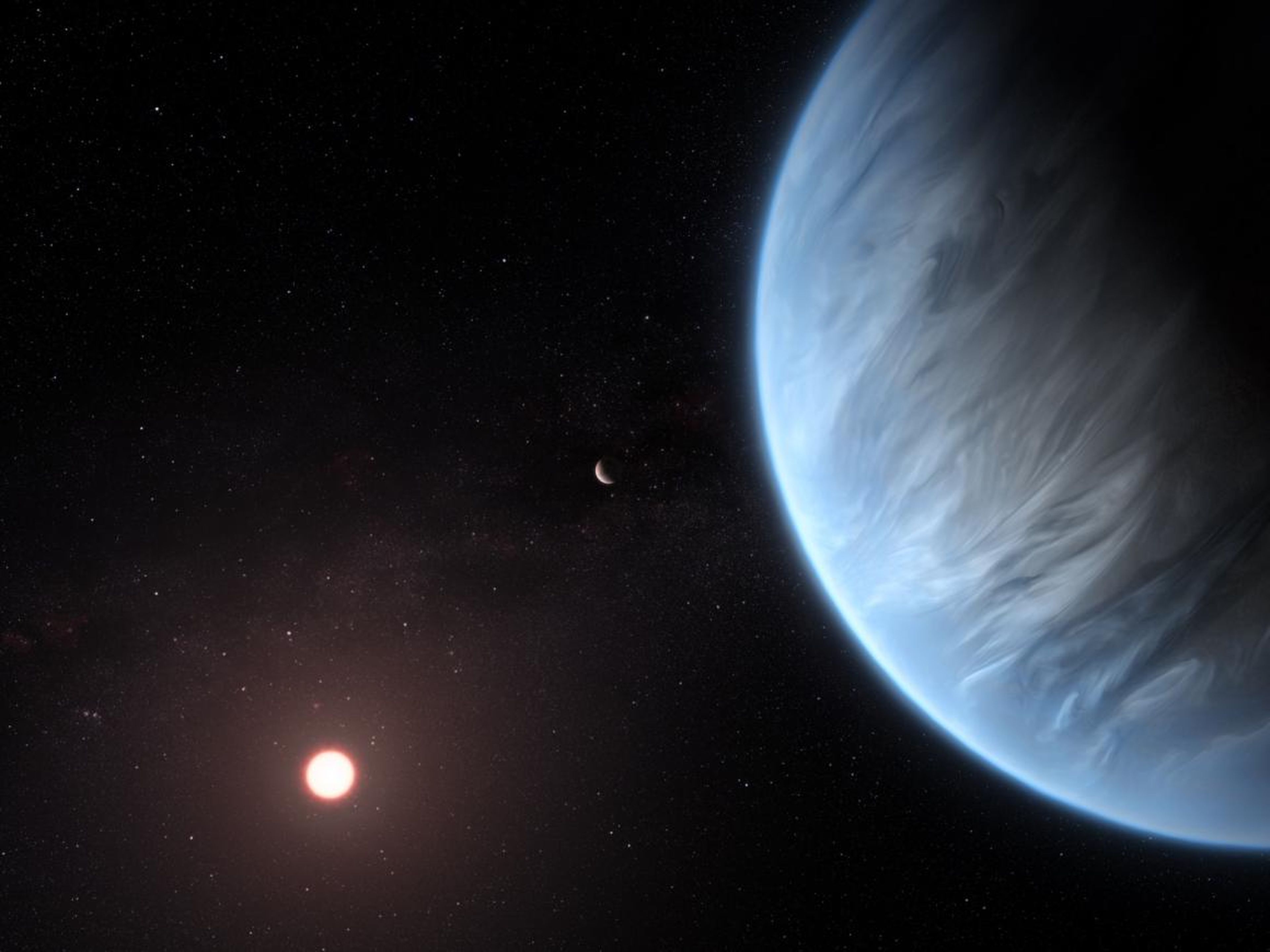 An artist's impression shows the planet K2-18b, the only exoplanet known to host both water and temperatures that could support life. Its host star and an accompanying planet in the system are also shown.
