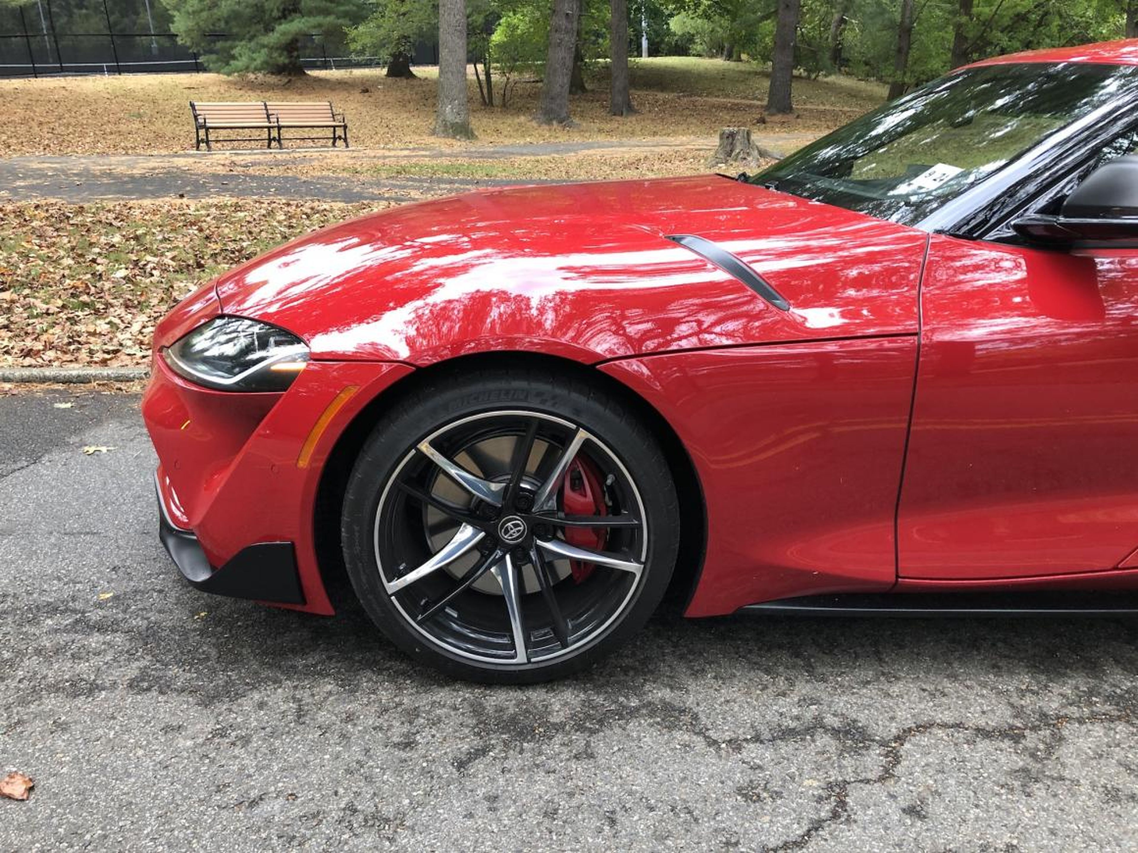 The hood creates a compelling illusion of length, giving the Supra a GT car's vibe even though it lacks a back seat. My tester's 19-inch forged allow wheels concealed vented-disc Brembo brakes, with red calipers.