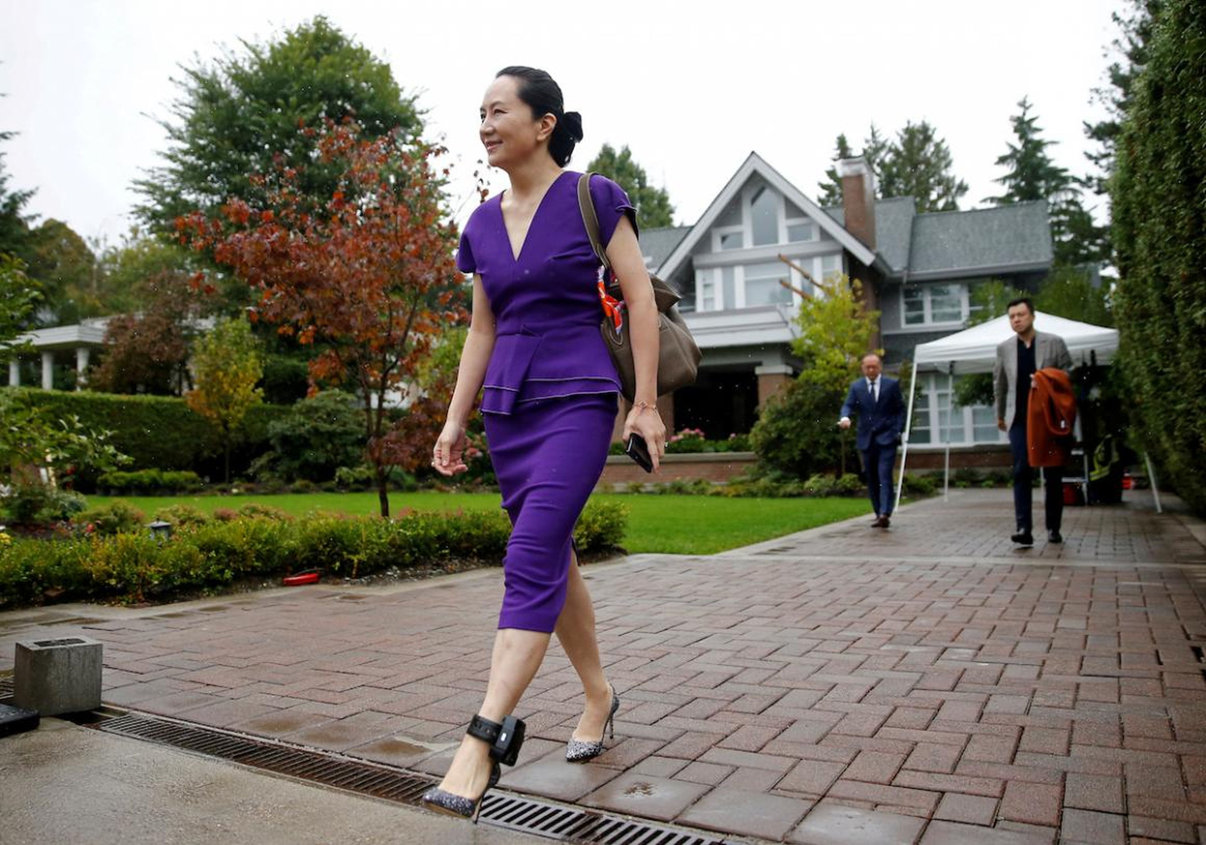 Huawei Technologies Chief Financial Officer Meng Wanzhou leaves her home to appear at a hearing at the Supreme Court of British Columbia in Vancouver, Canada on September 23. Wanzhou was arrested in December 2018 in Vancouver on