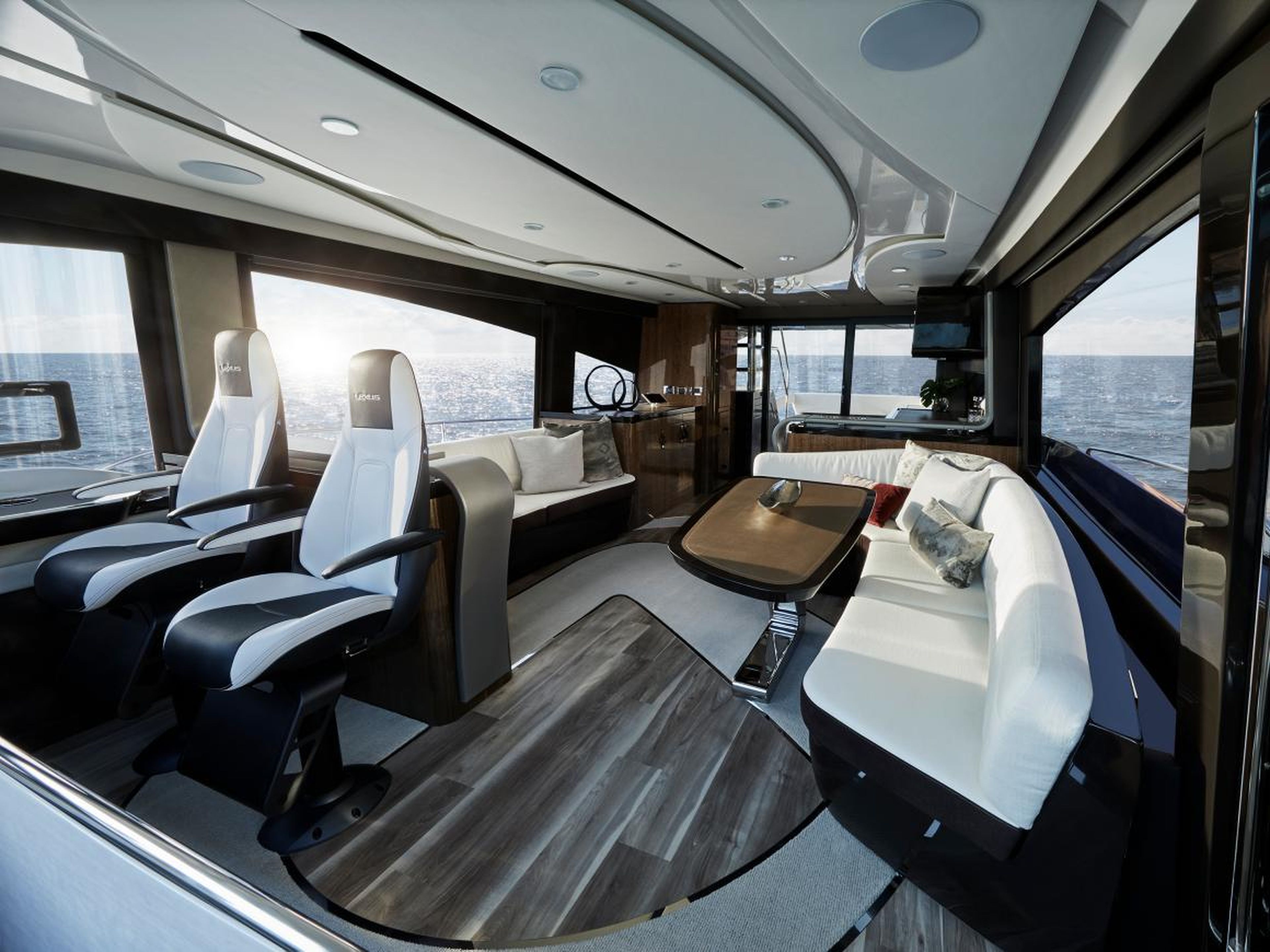 The interior has the brand's distinctive leather seating in white for the two captain seats and the sofas.