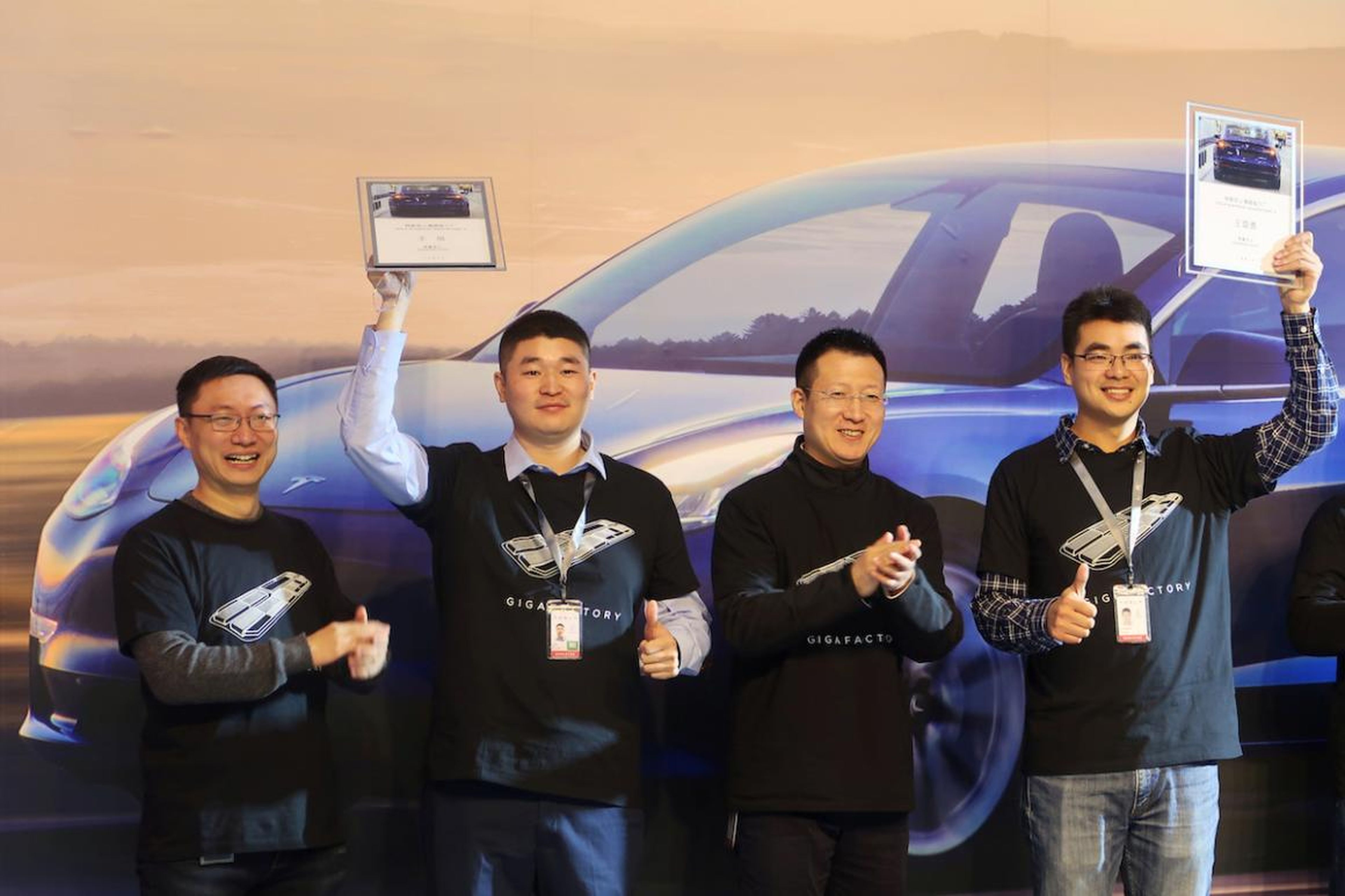 "From now onwards China-made Model 3 vehicles will start running on China's large streets and small lanes," Tesla Vice President Tao Lin said at the delivery ceremony which was attended by employees and Shanghai government