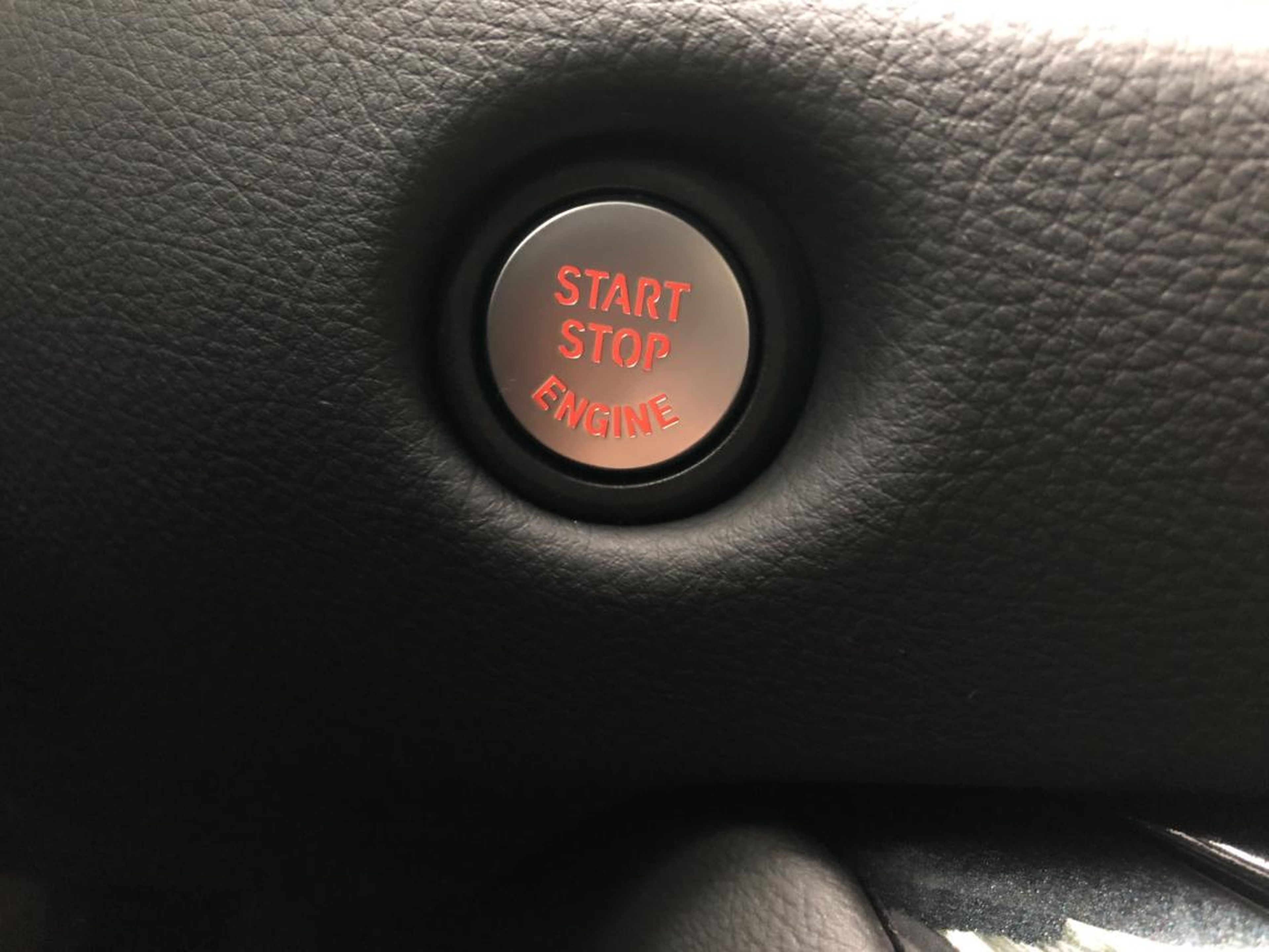 The push-button start-stop is awkwardly located behind the wheel.