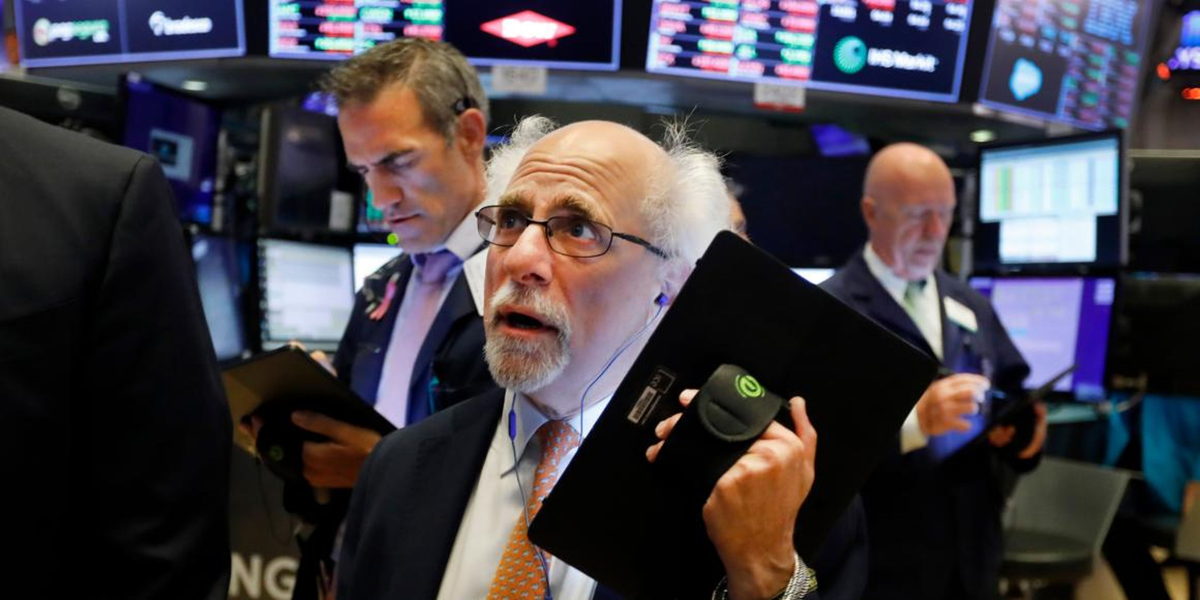 Trader Peter Tuchman works on the floor of the New York Stock Exchange, Monday, July 8, 2019.