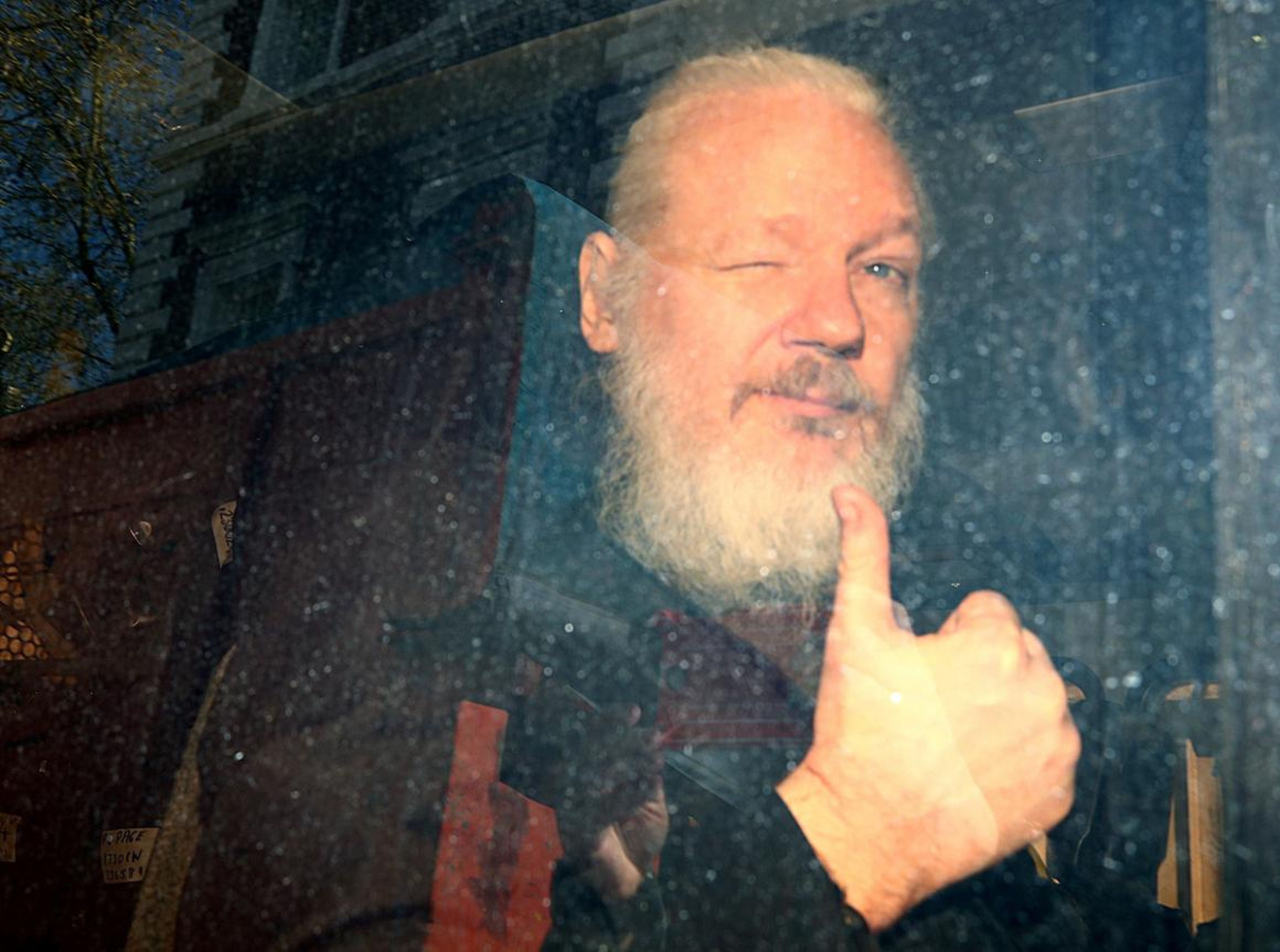 WikiLeaks founder Julian Assange arrives at the Westminster Magistrates Court after he was arrested in London on April 11, following several years of living inside the Ecuadorian embassy, near the famed Harrods department store.