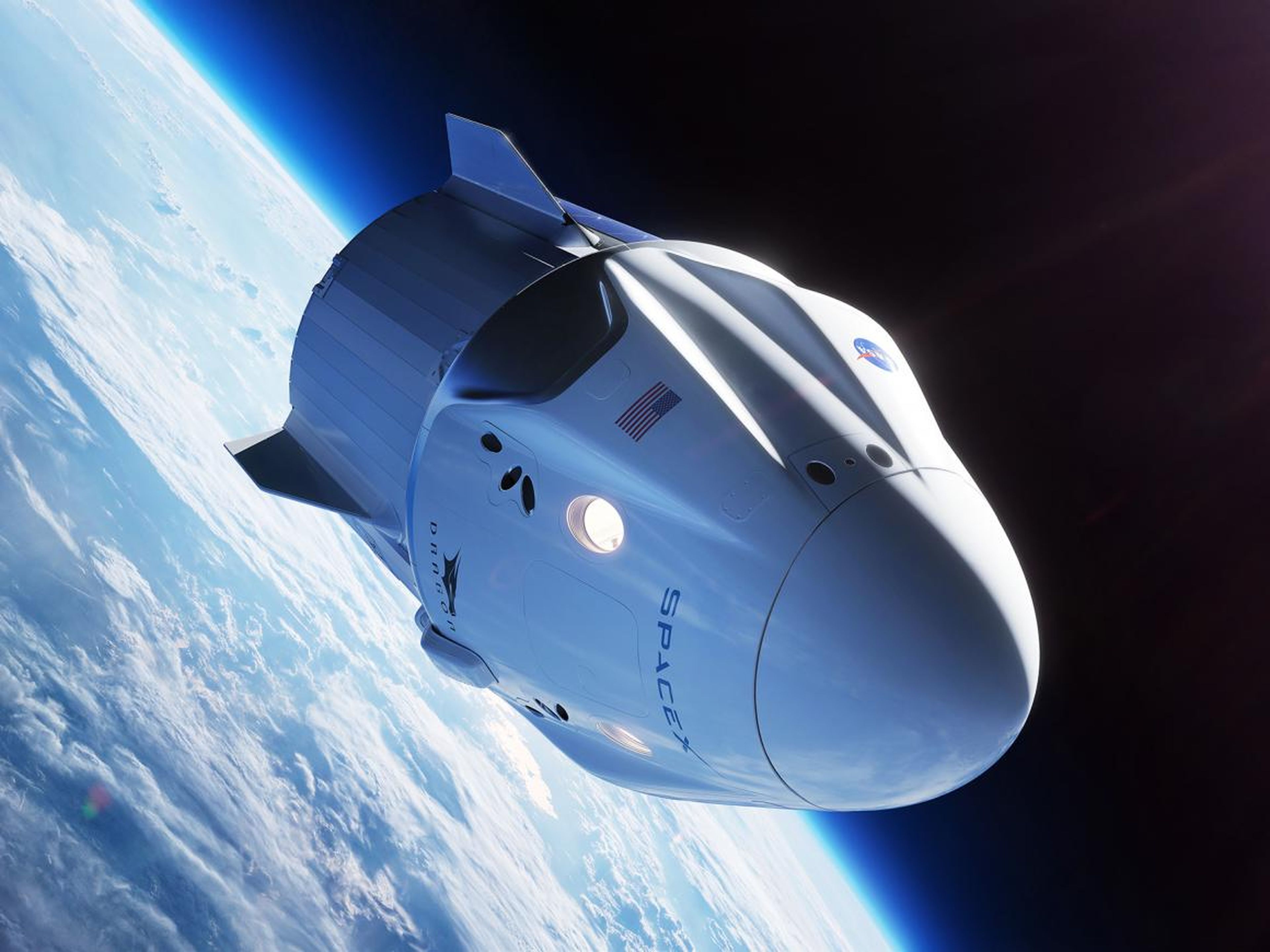 Ilustración de la nave espacial Crew Dragon de SpaceX orbitando la Tierra.