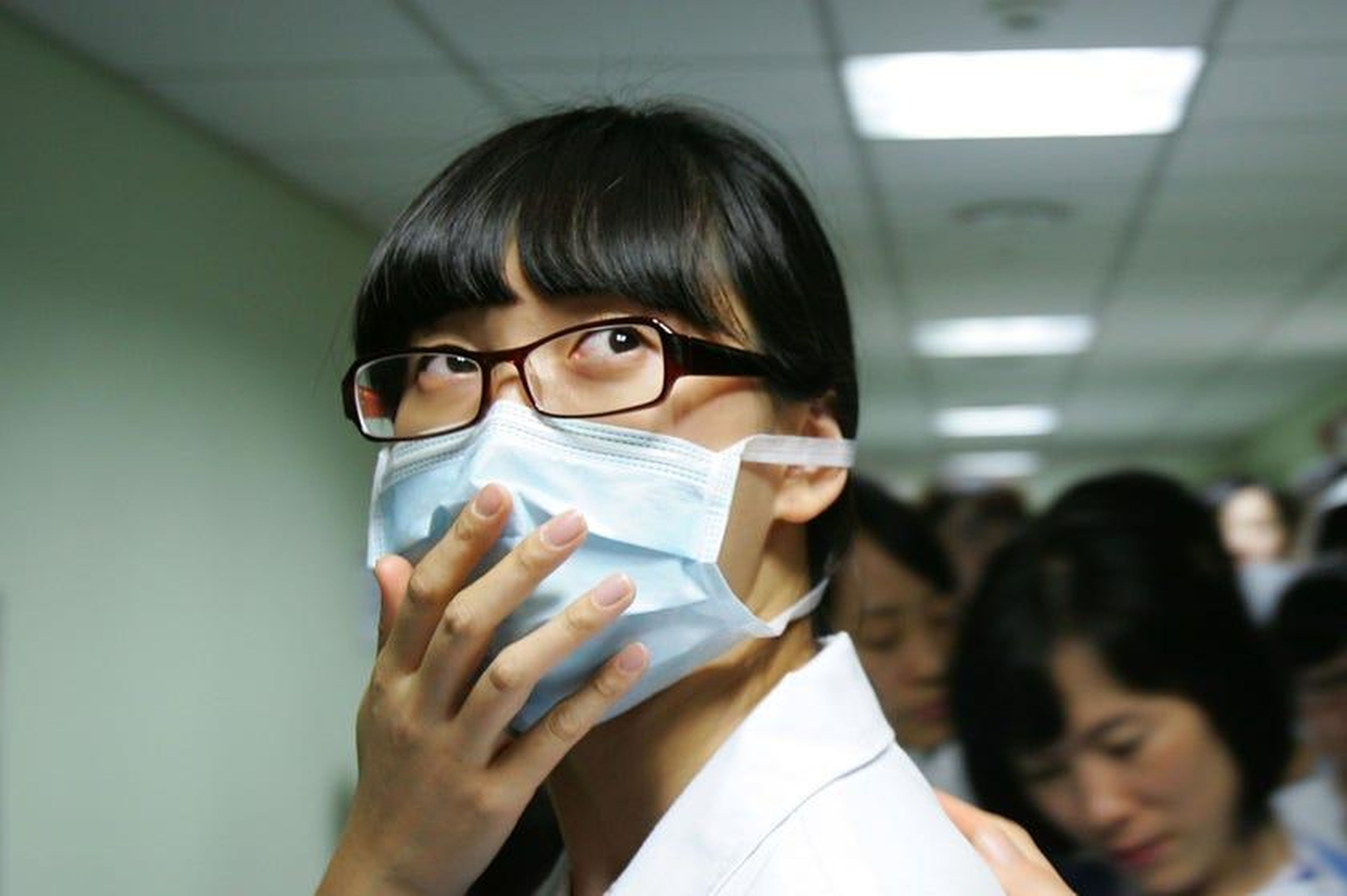 A doctor wears a mask during the H1N1 flu outbreak.