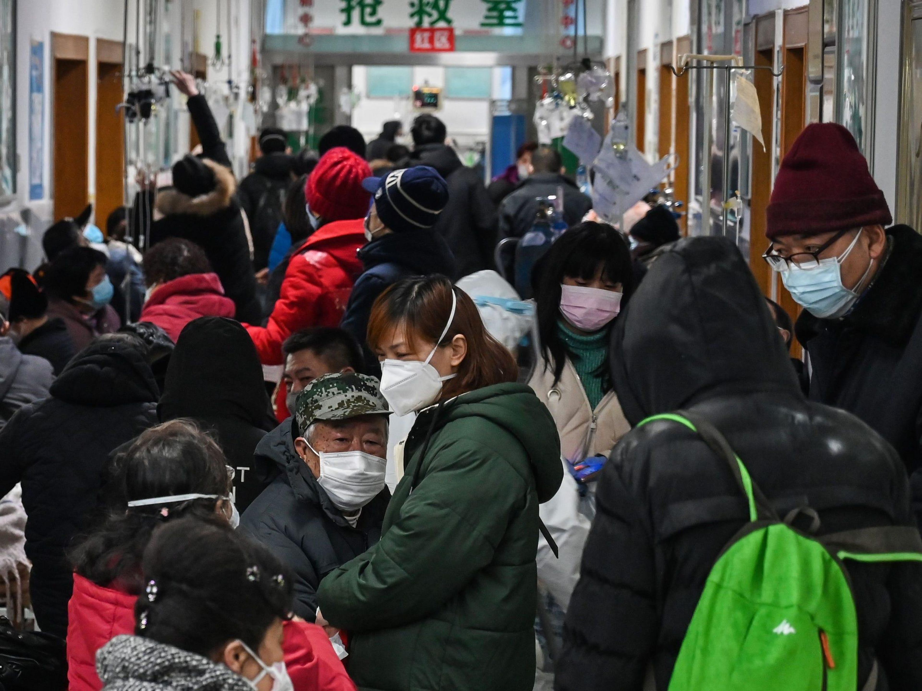 People wait for medical attention at Wuhan Red Cross Hospital on January 25, 2020.