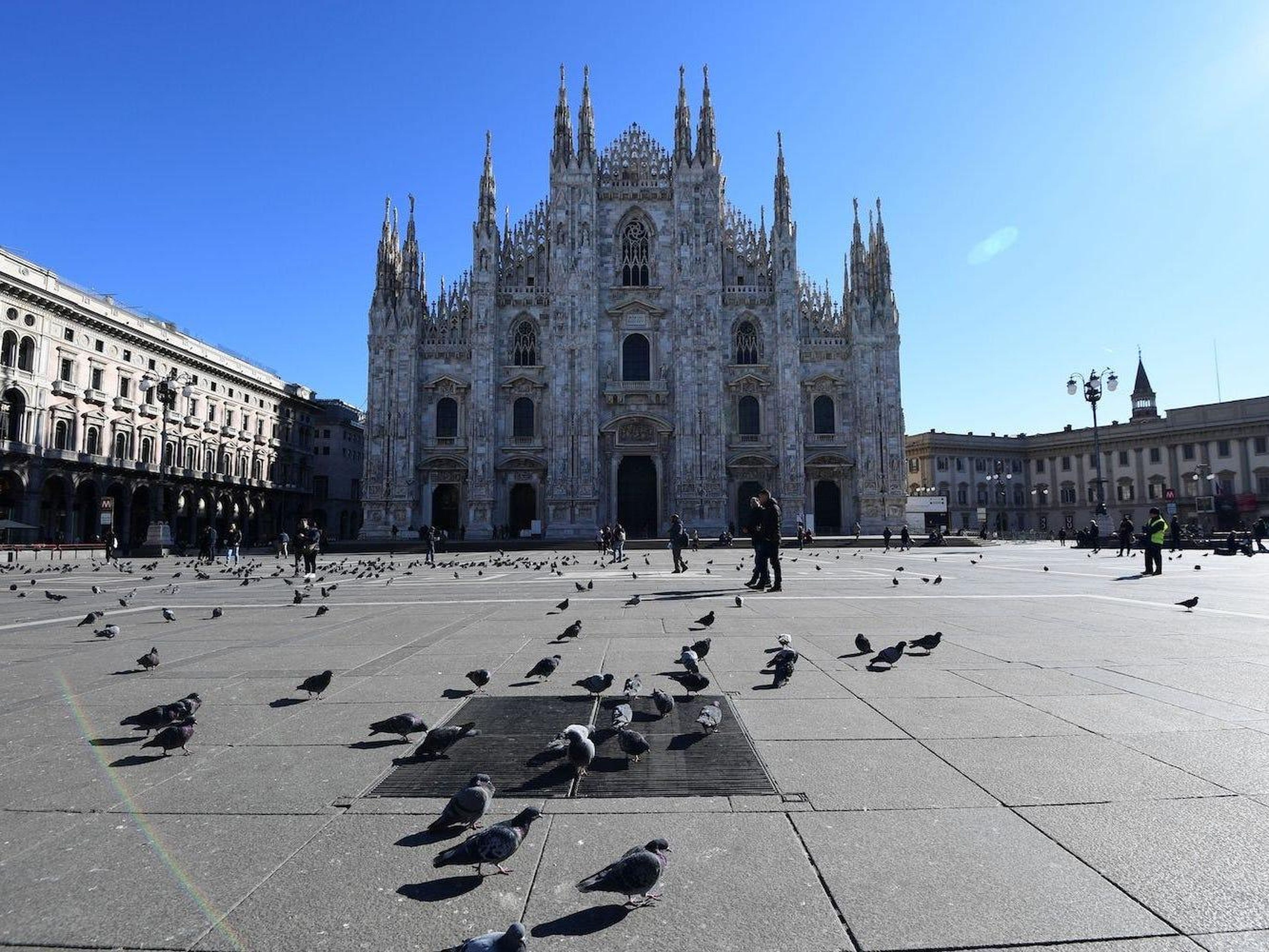 AFTER: With Italy on lockdown, few venture outside. The Duomo closed its doors to visitors on February 25.