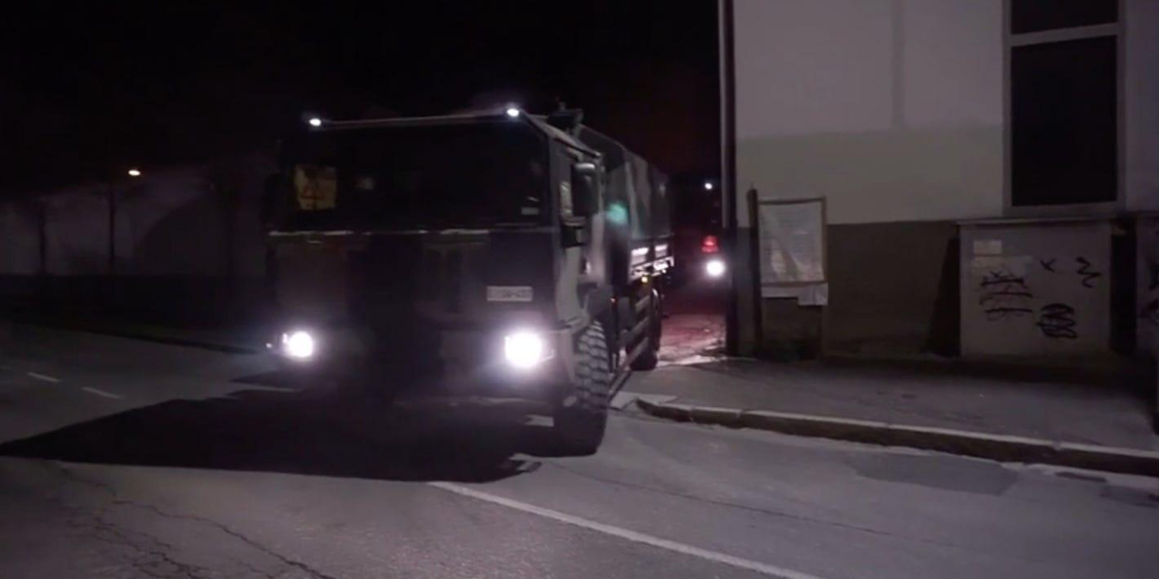 An Italian military truck leaving a crematorium in Bergamo, Italy, on Wednesday night.