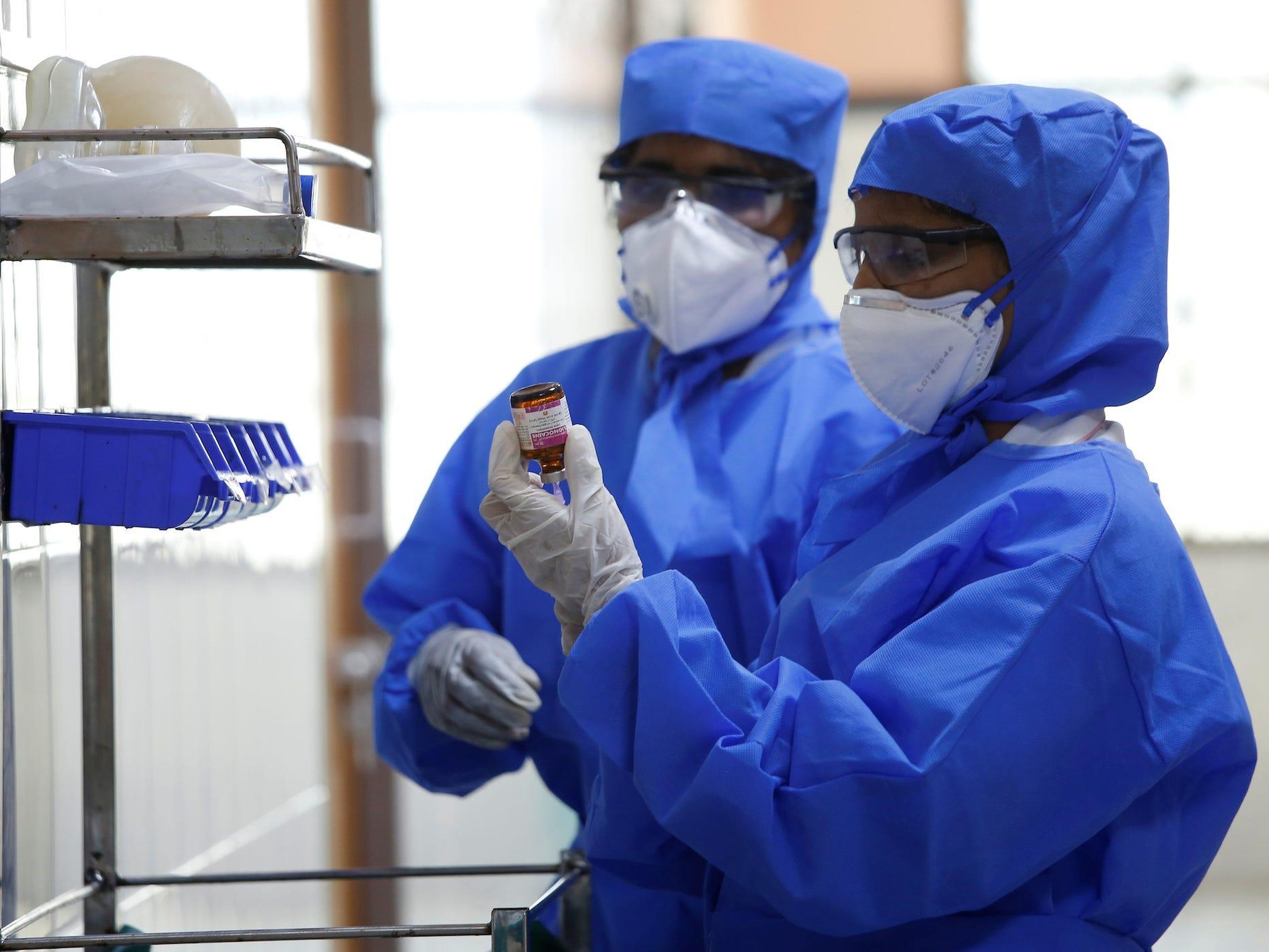 Medical staff with protective clothing in a ward for people suspected of having the new coronavirus at a hospital in Chennai, India, on January 29.
