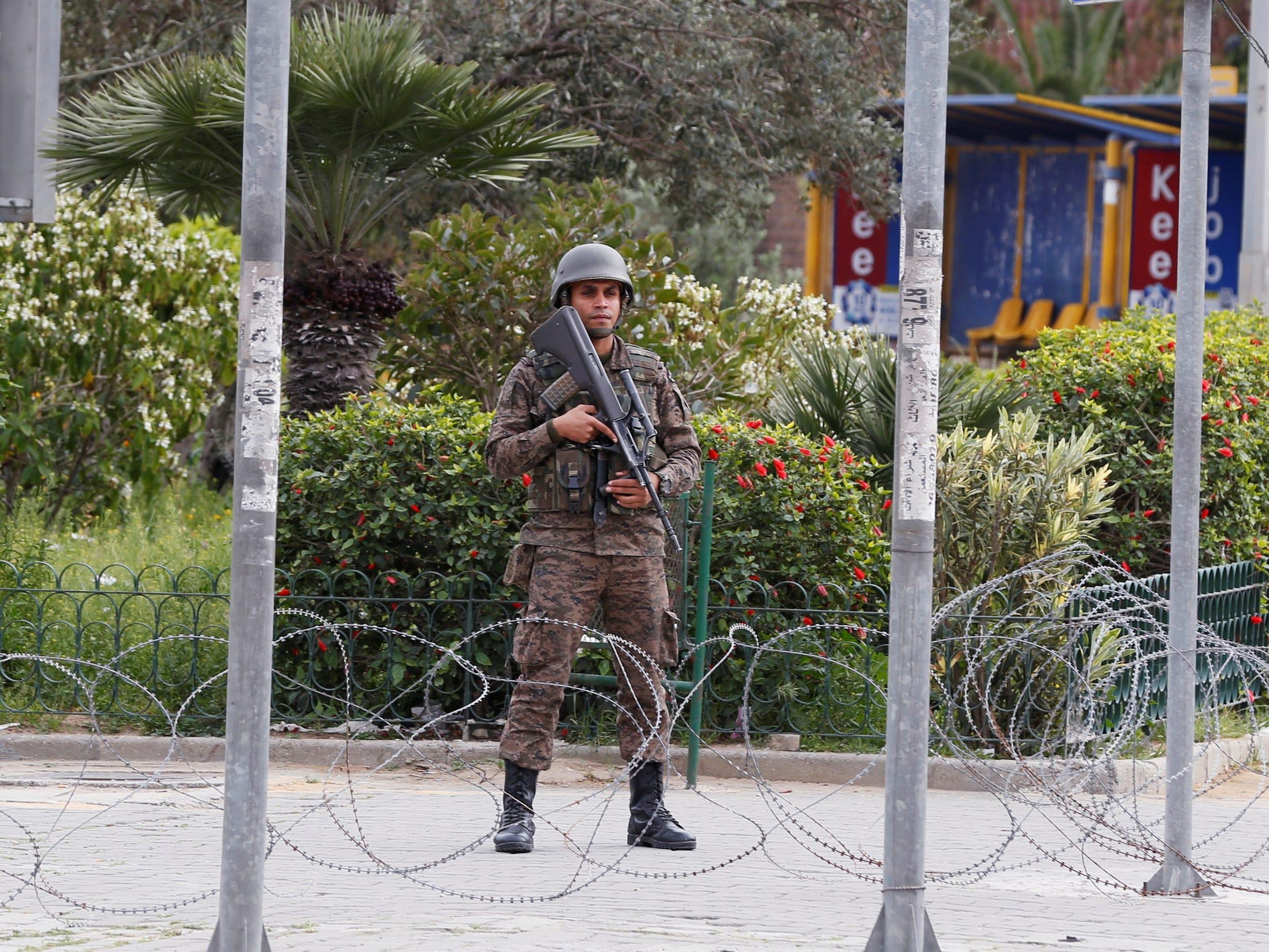 A soldier stands in downtown Tunis on March 24, after Tunisia's president ordered the army to patrol the streets and enforce lockdowns to stop the spread of coronavirus.