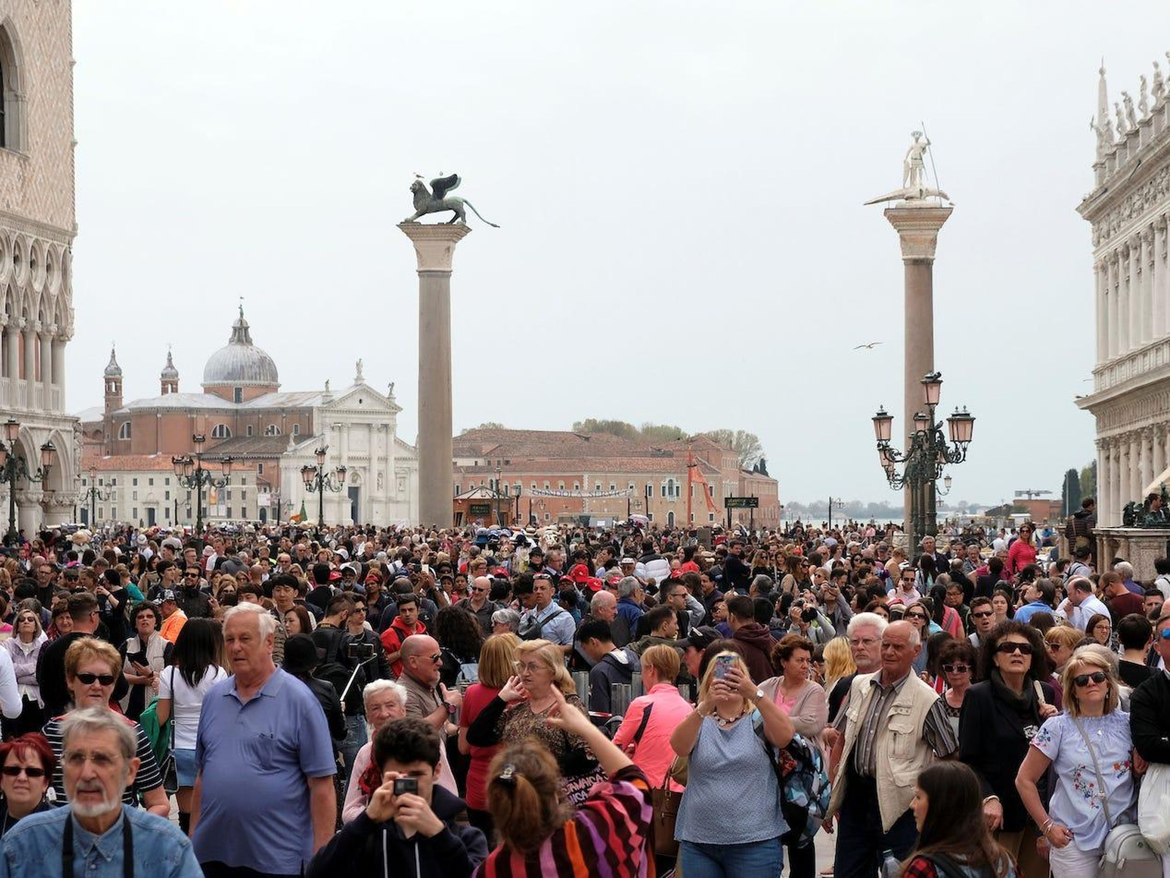 BEFORE: St. Mark's Square in Venice, Italy, is a tourist hot spot that sees 26 million to 30 million visitors annually.