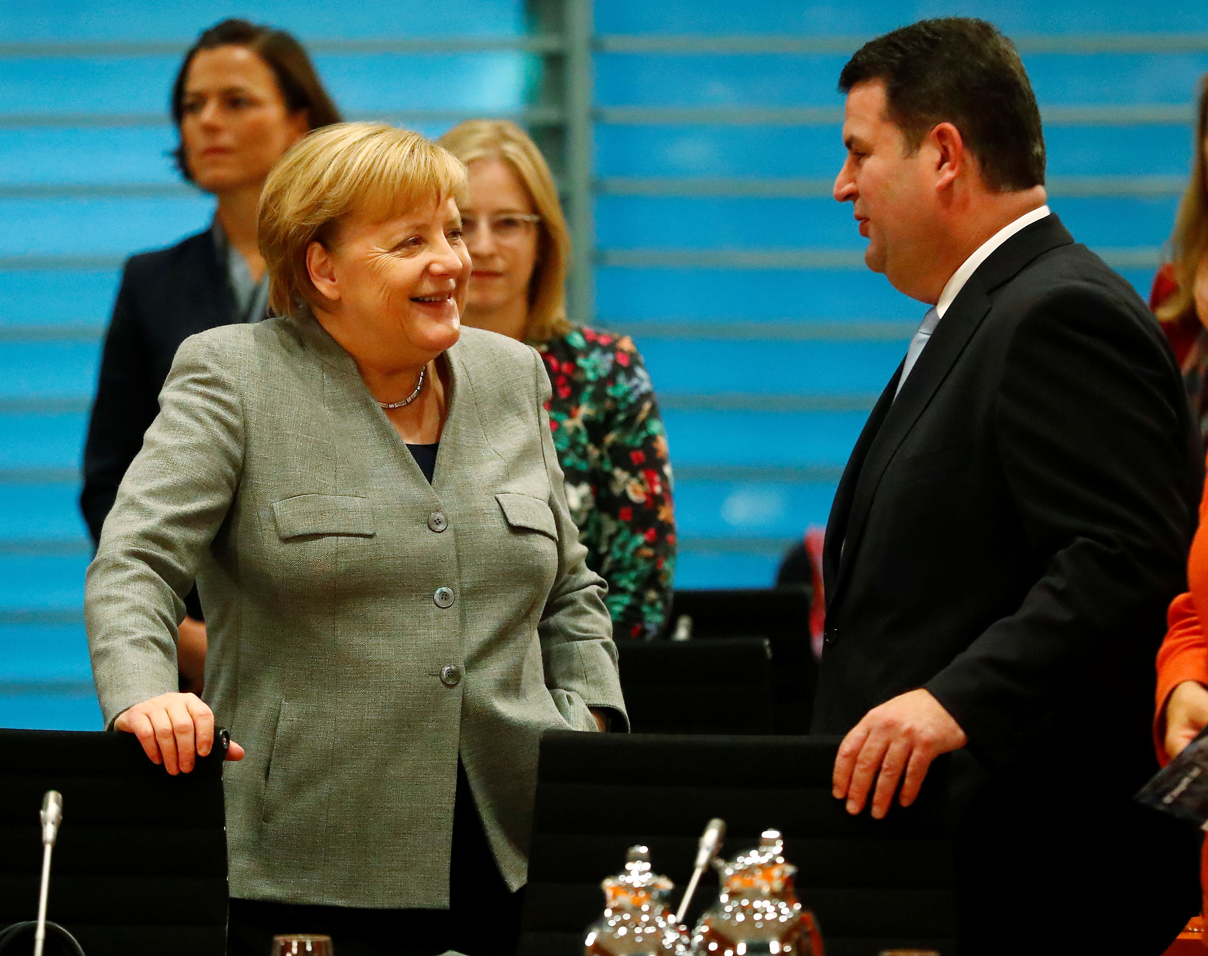 La canciller alemana, Angela Merkel, y el ministro de Trabajo alemán, Hubertus Heil.