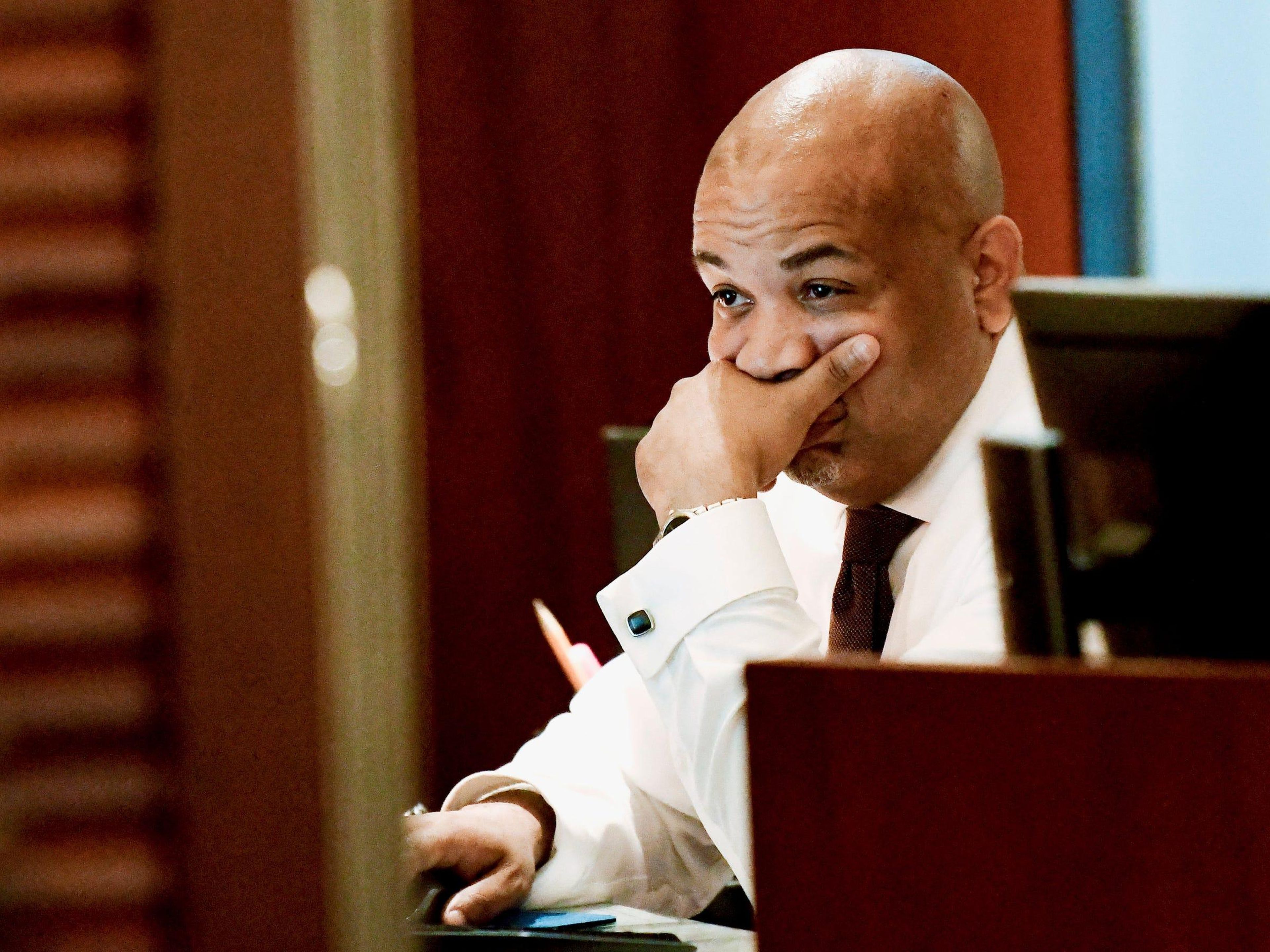New York state Assembly Speaker Carl Heastie looks at his computer screen.