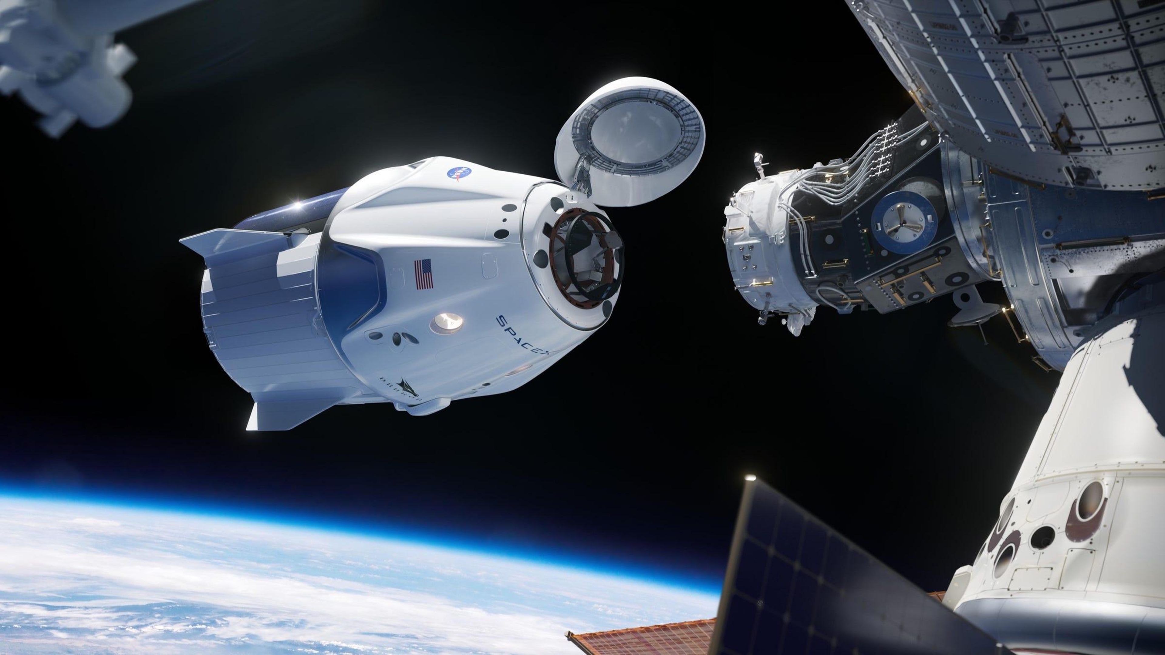 La ilustración de un artista muestra la nave espacial SpaceX Crew Dragon acoplándose a la Estación Espacial Internacional.