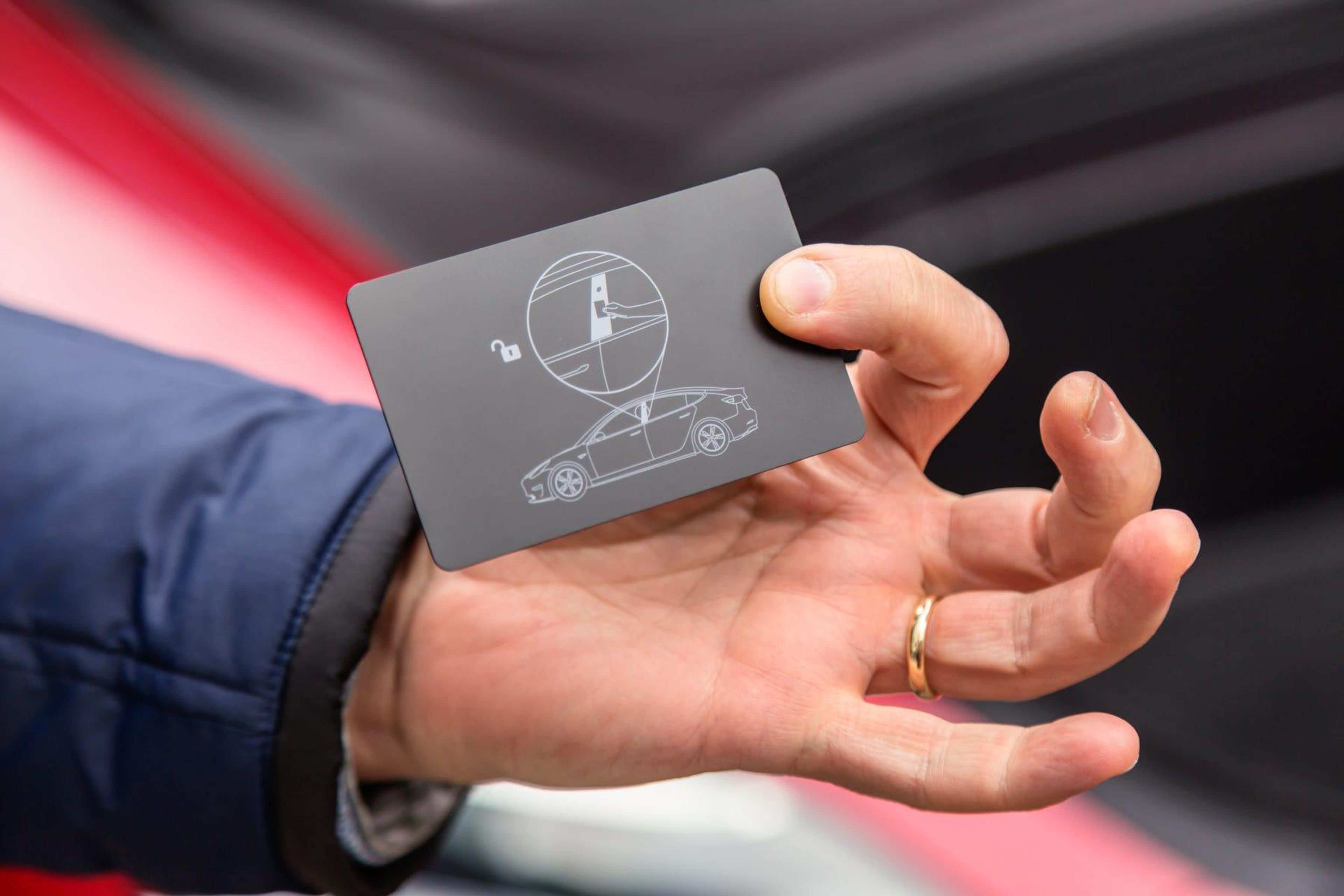 The Model 3 does away with the key fob. Instead, there's a credit-card-sized valet/backup key ...