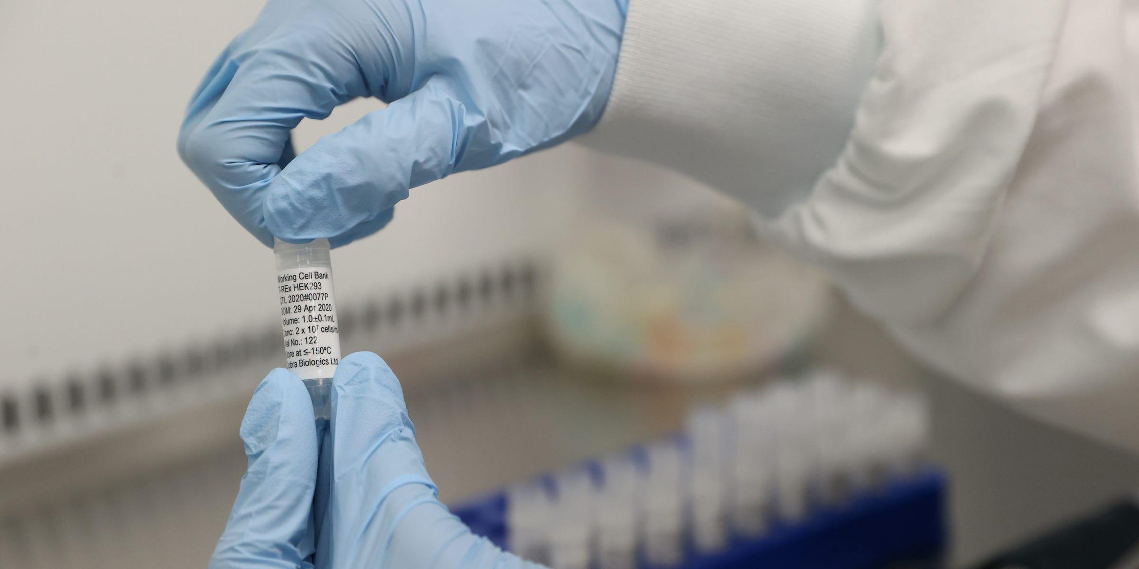 Scientists work on a potential coronavirus vaccine in Keele, Britain.
