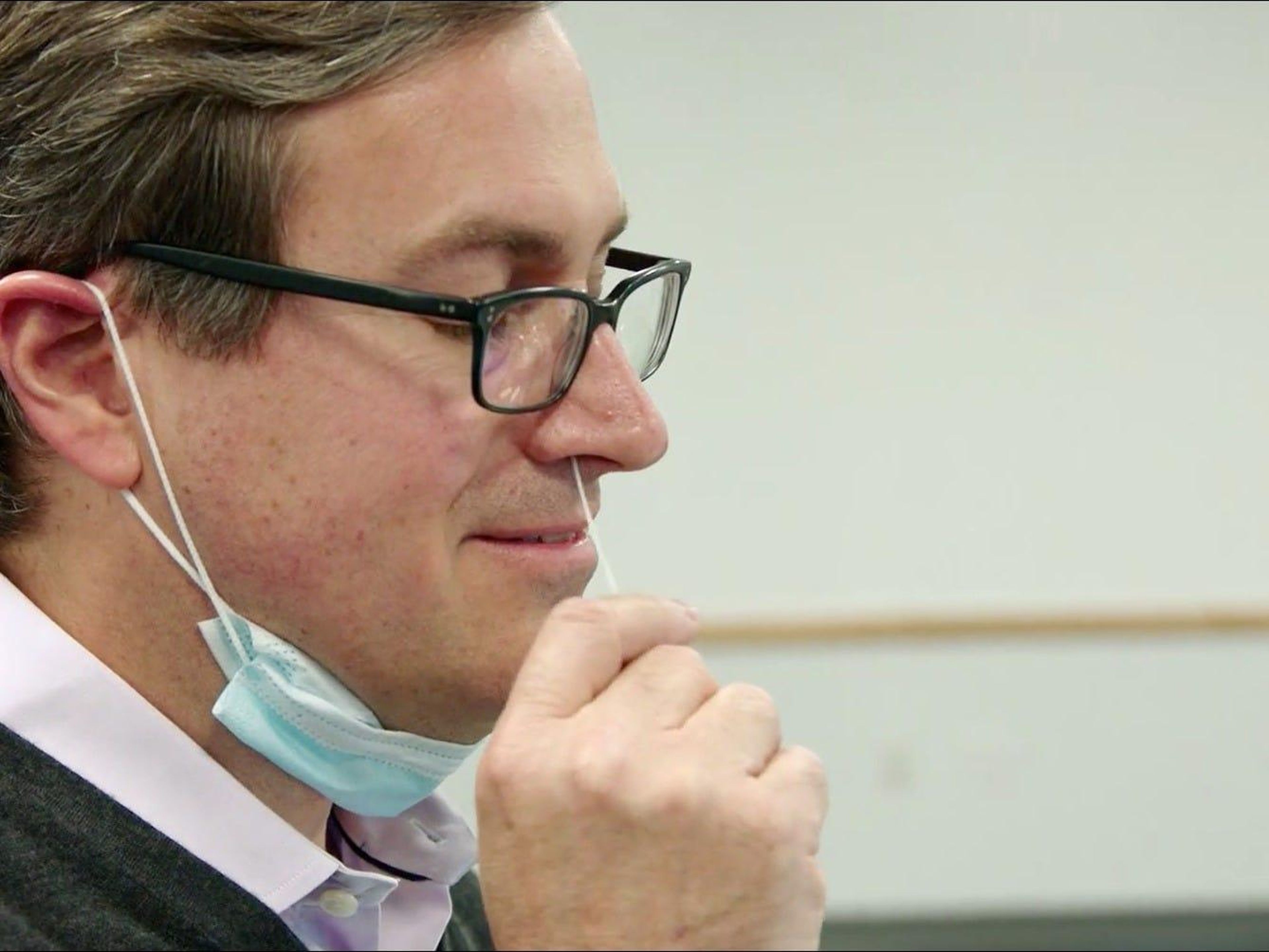 Amazon vice president of worldwide operations Dave Clark swabs himself for COVID-19 during a CBS "60 Minutes" segment.