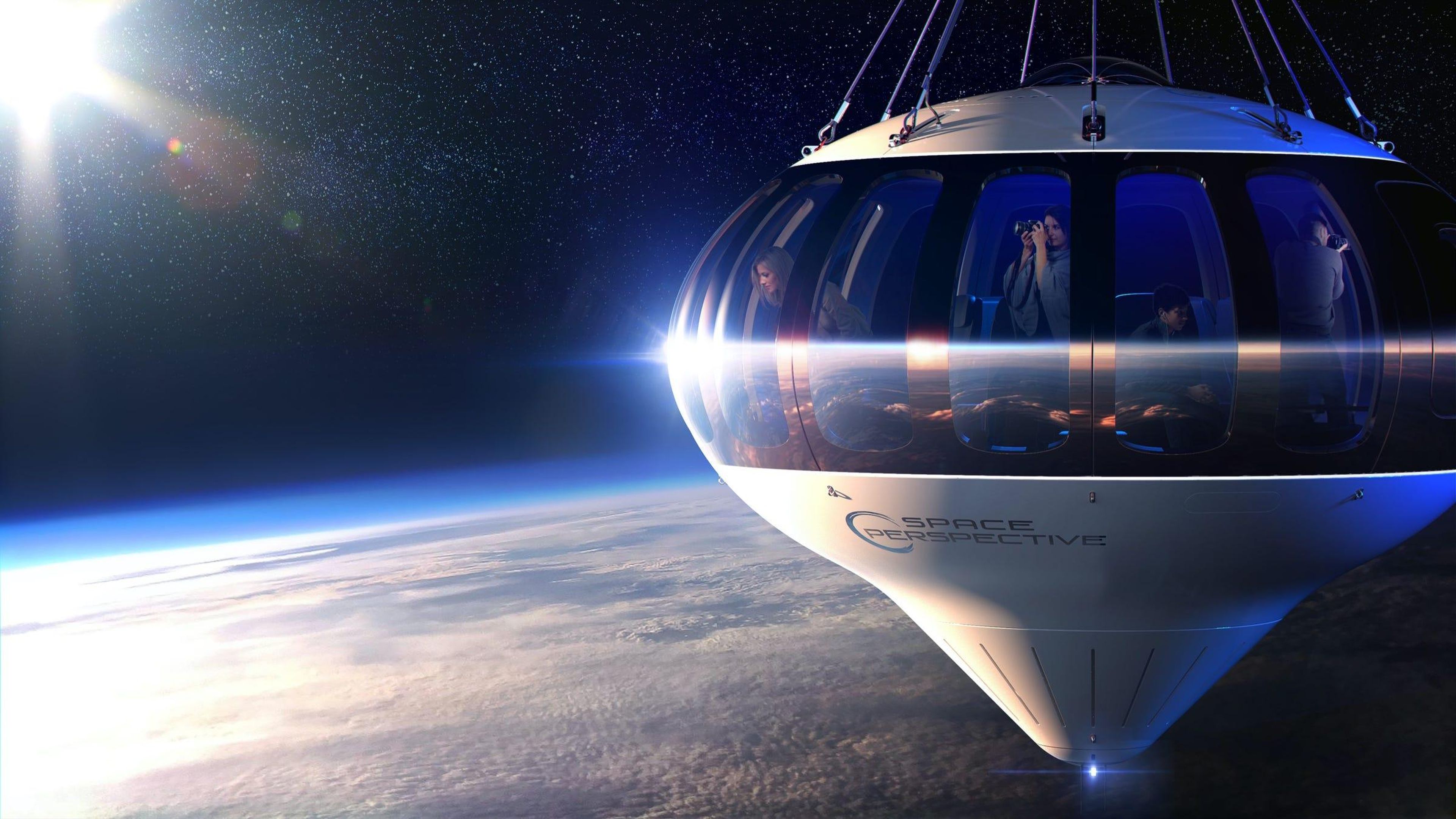 An illustration of Space Perspective's planned crew capsule, the Neptune, dangling from the end of a stratospheric balloon with eight passengers and a pilot inside. Space Perspective