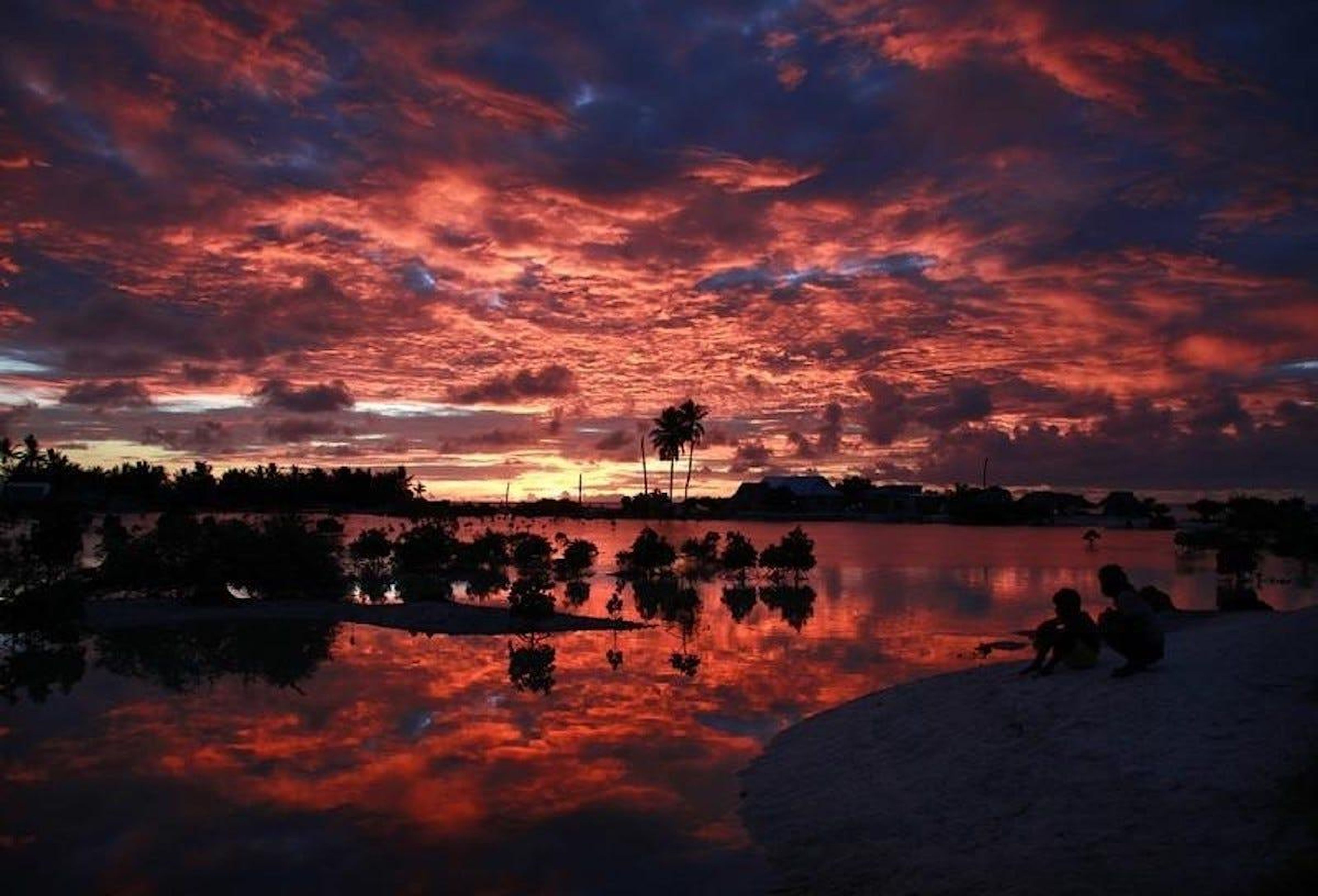 Sunset over a small lagoon near the village of Tangintebu on South Tarawa, Kiribati.