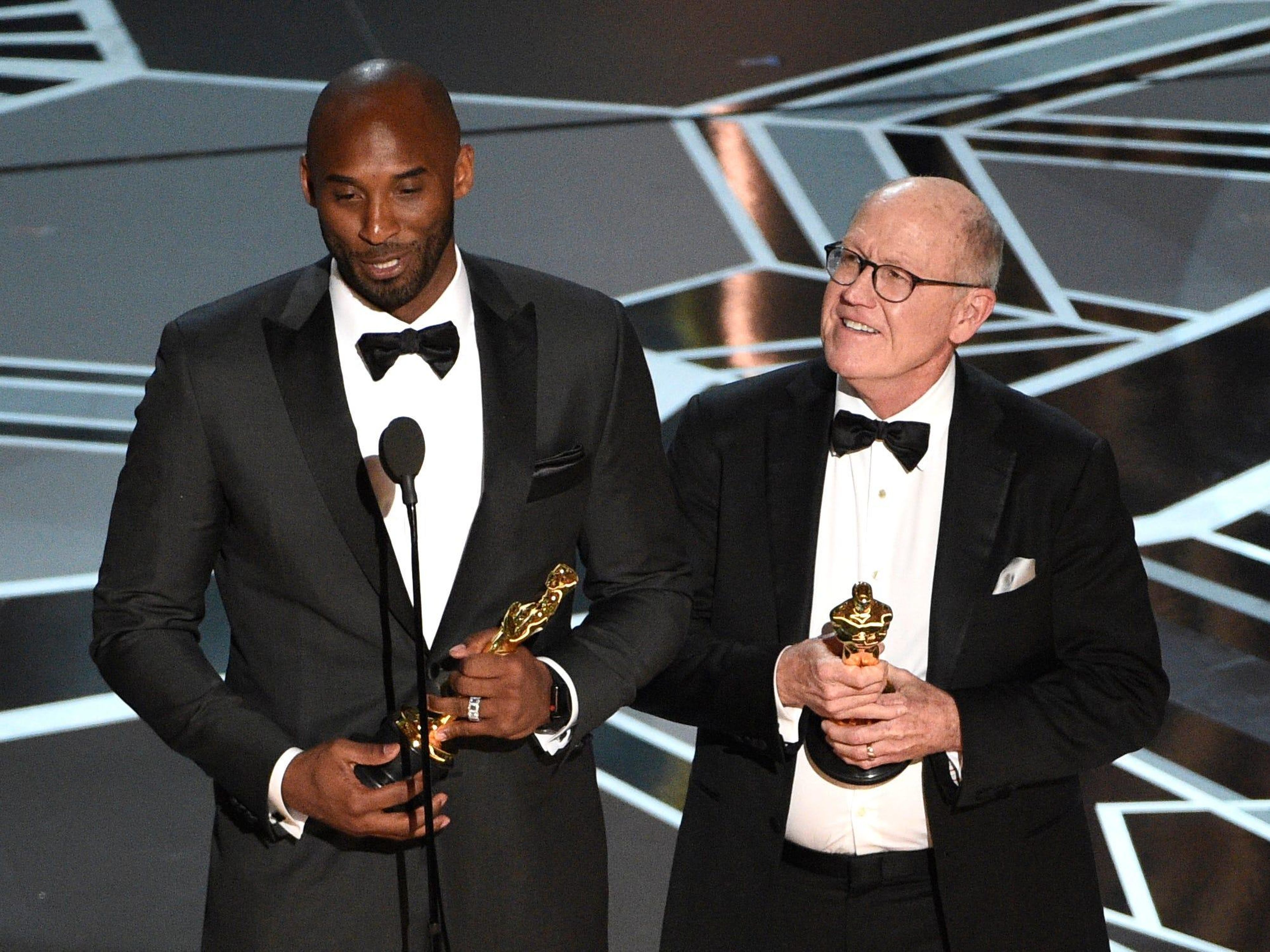 Kobe Bryant (left) and Glen Keane accept the award for best animated short for "Dear Basketball" at the Oscars on Sunday, March 4, 2018.