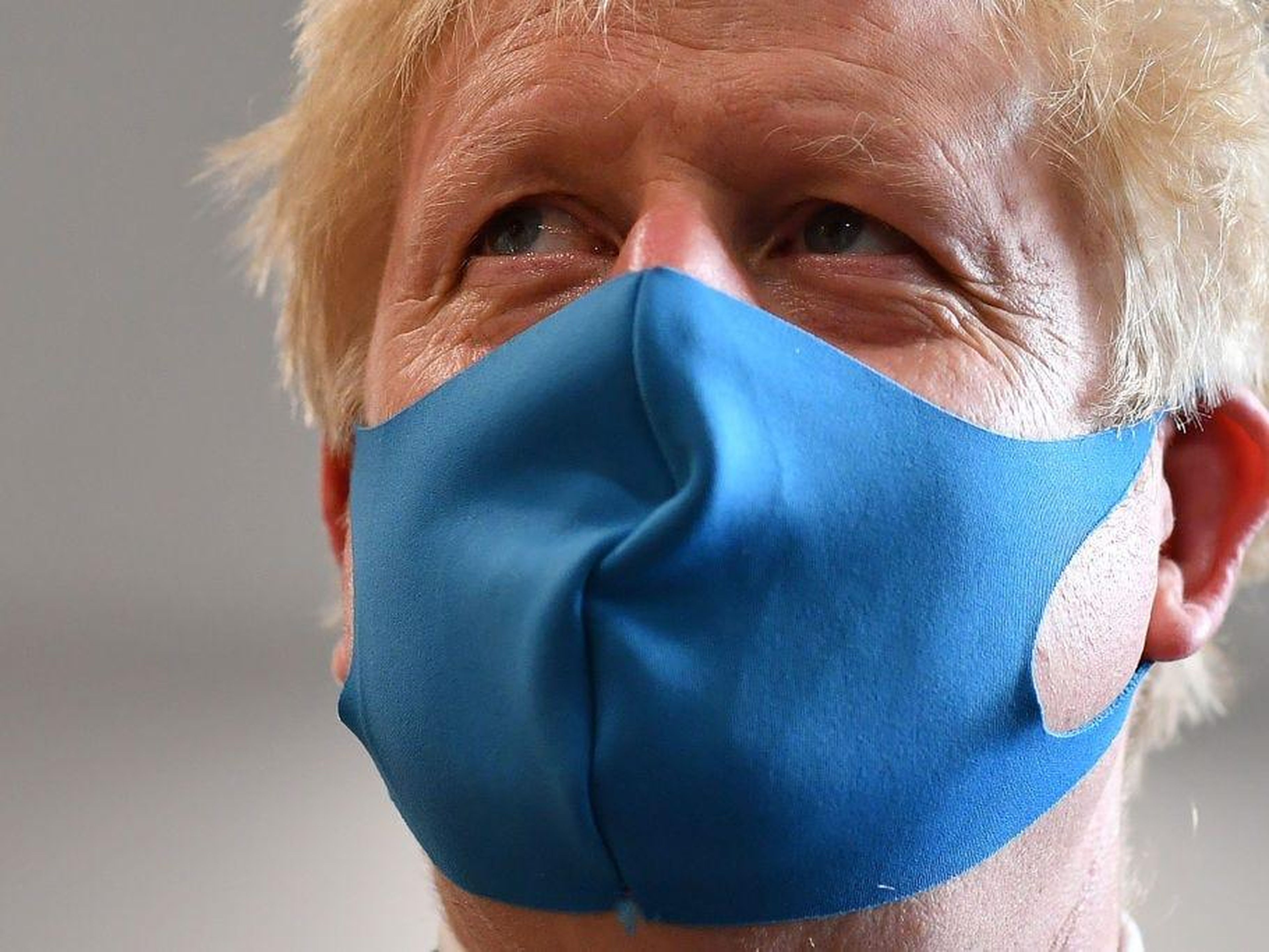 Britain's Prime Minister Boris Johnson, wearing a face mask or covering due to the COVID-19 pandemic, visits the headquarters of the London Ambulance Service NHS Trust on July 13, 2020 in London, England. Getty