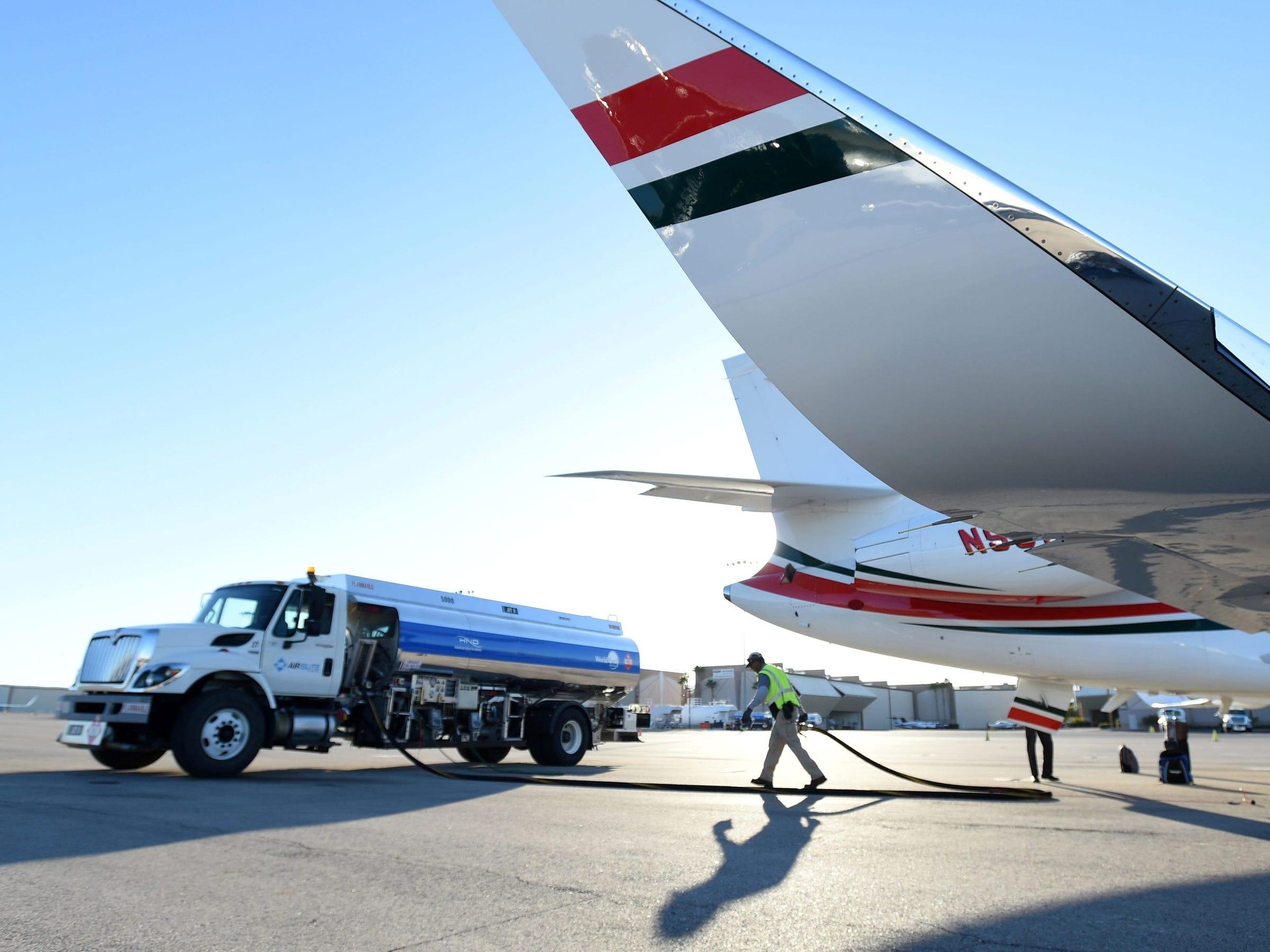A private jet receiving jet fuel for its next flight. David Becker/Reuters