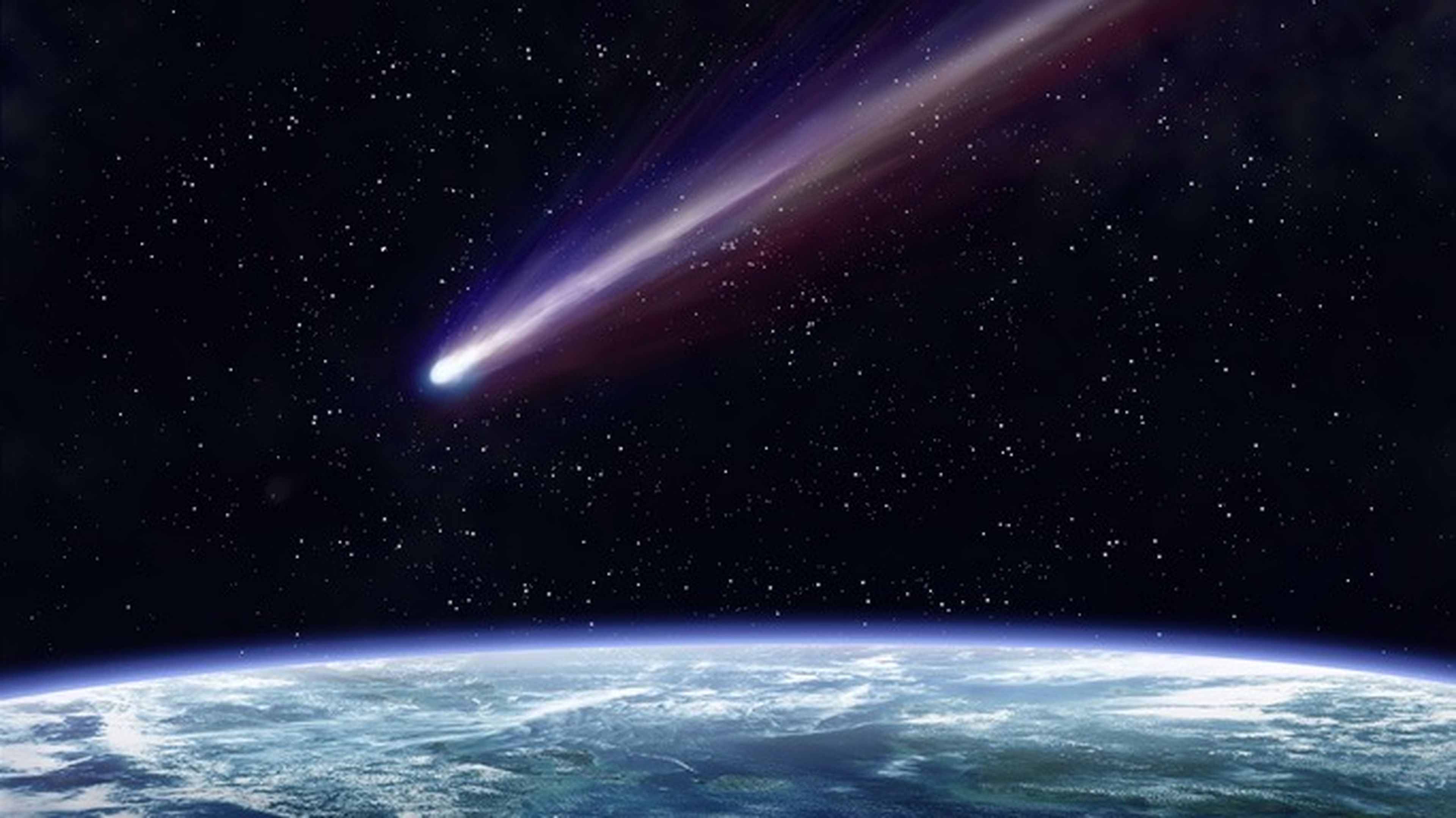 Asteroide sobre la Tierra.