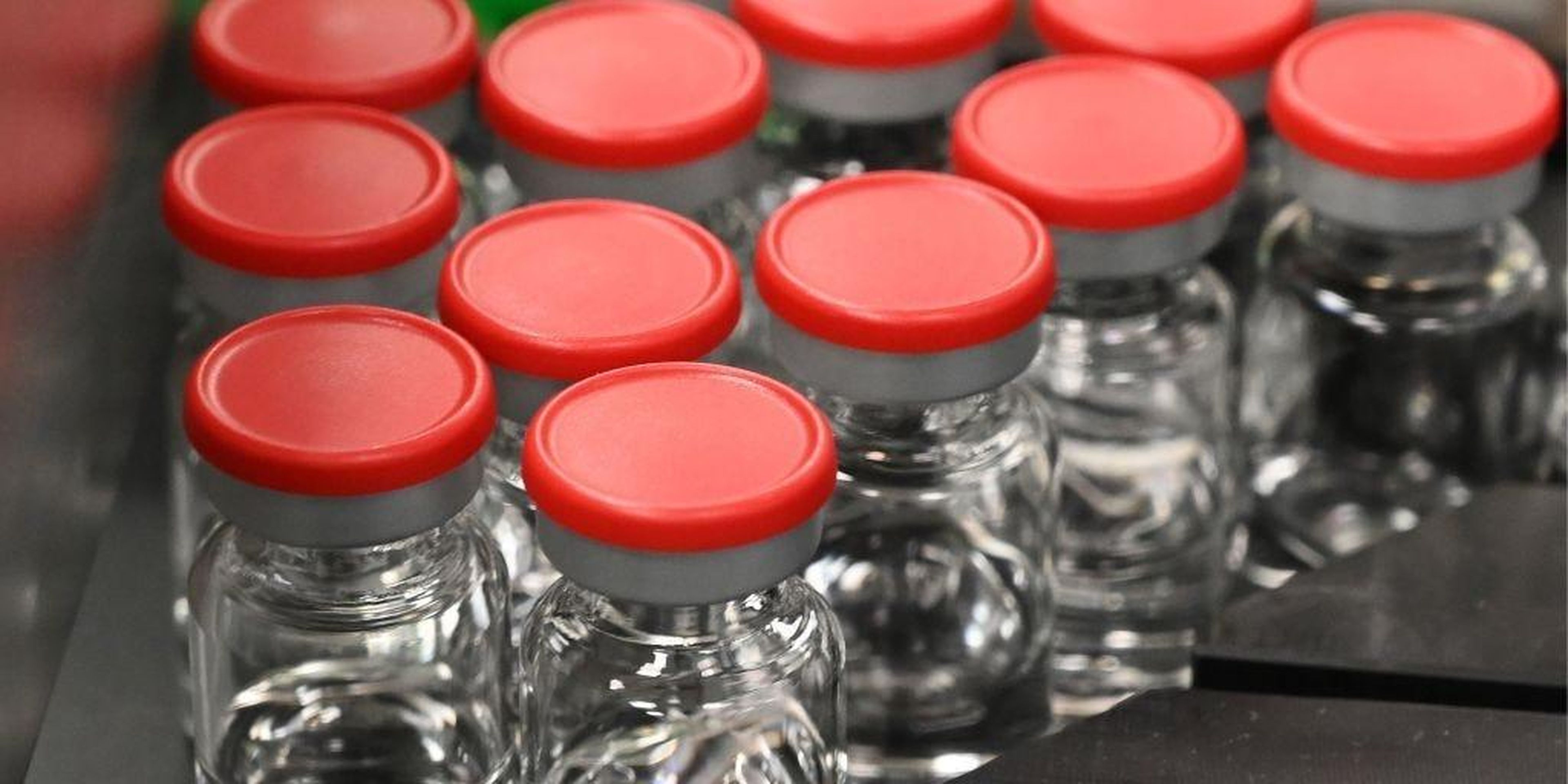 Capped vials are being pictured during filling and packaging tests for the large-scale production and supply of the University of Oxford's COVID-19 vaccine candidate, AZD1222.