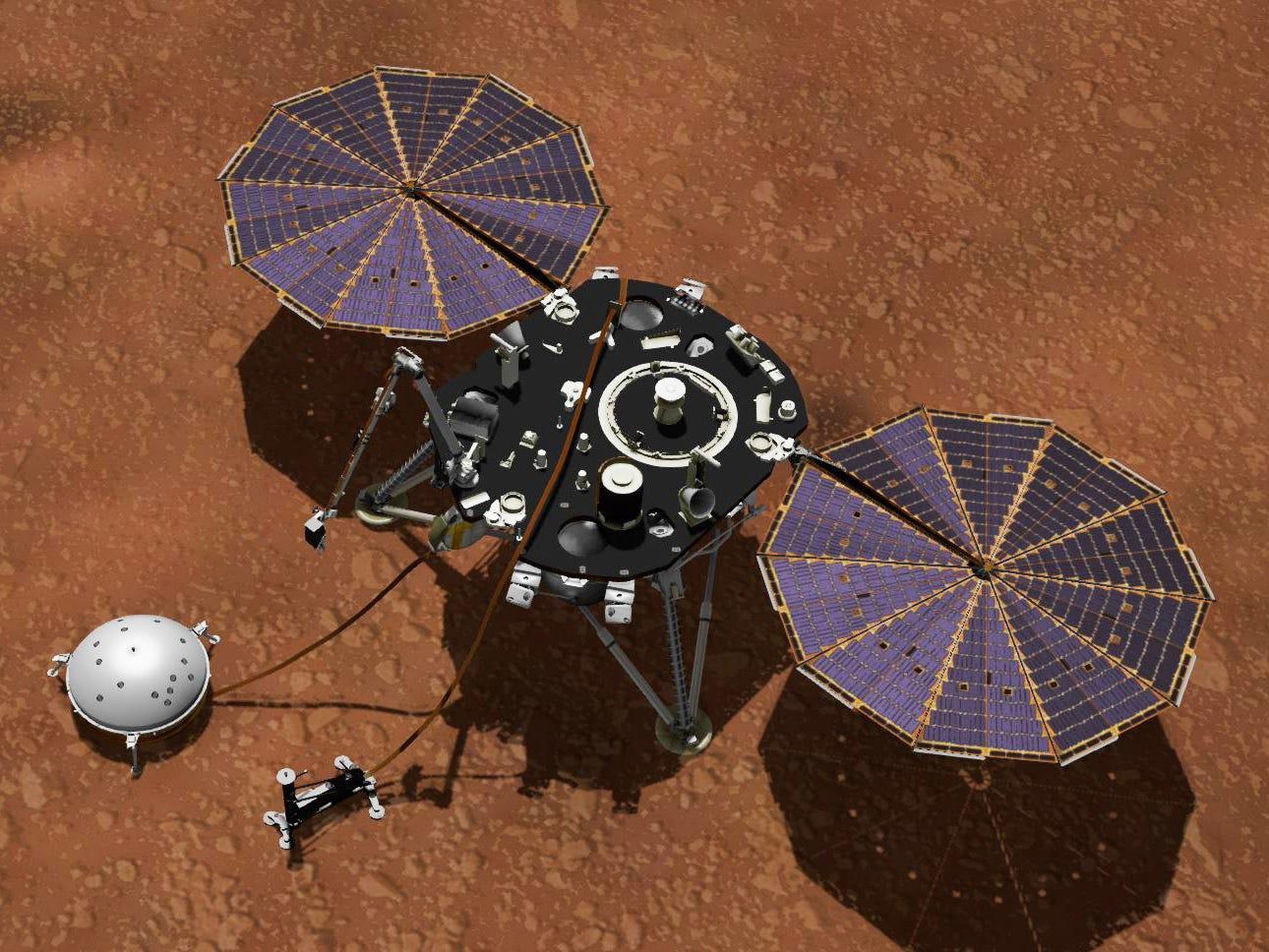 La ilustración de un artista muestra el módulo de aterrizaje InSight de la NASA con sus instrumentos desplegados en la superficie marciana. El sismómetro es el dispositivo redondo de la izquierda.
