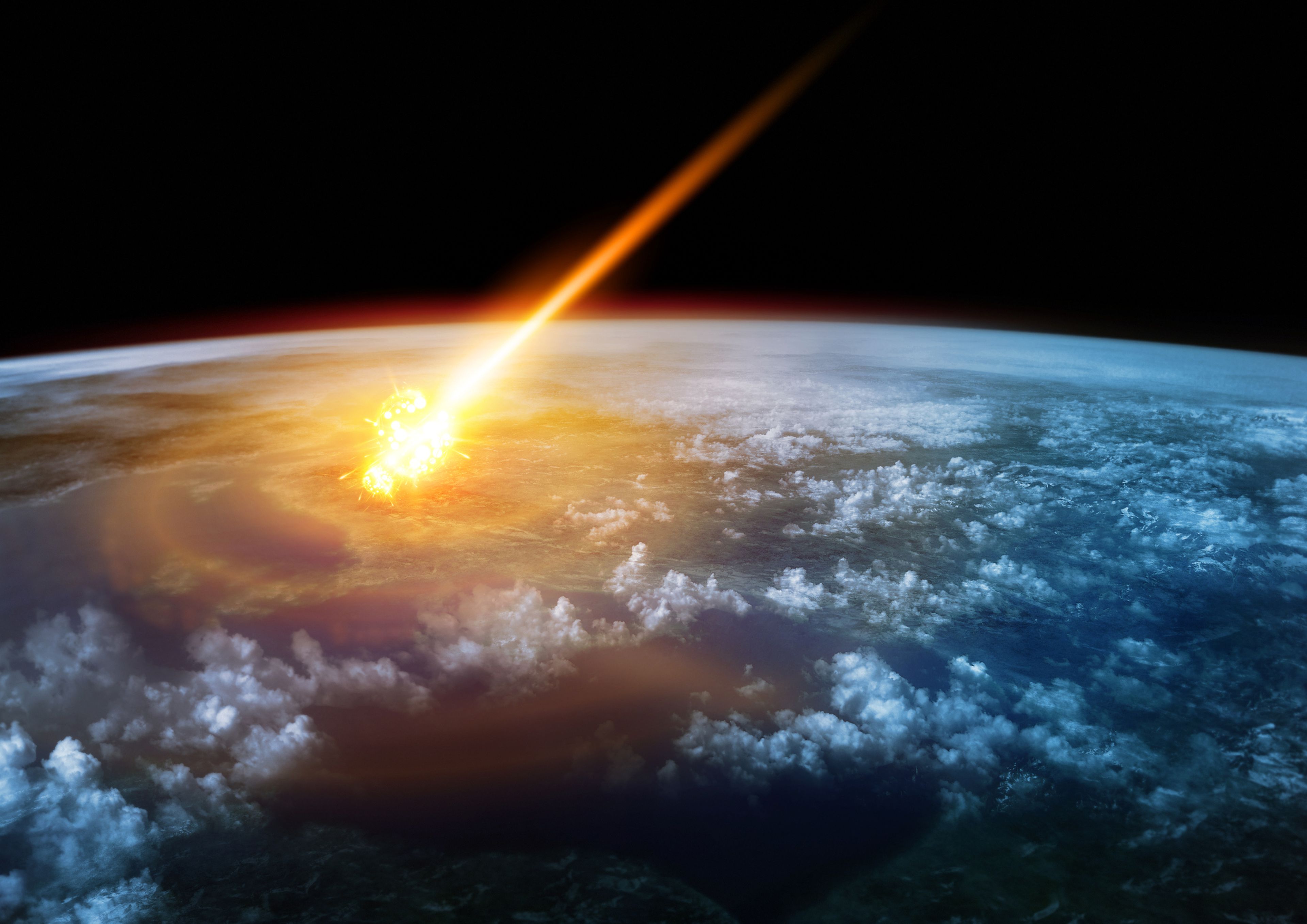Meteorito cayendo sobre la Tierra.