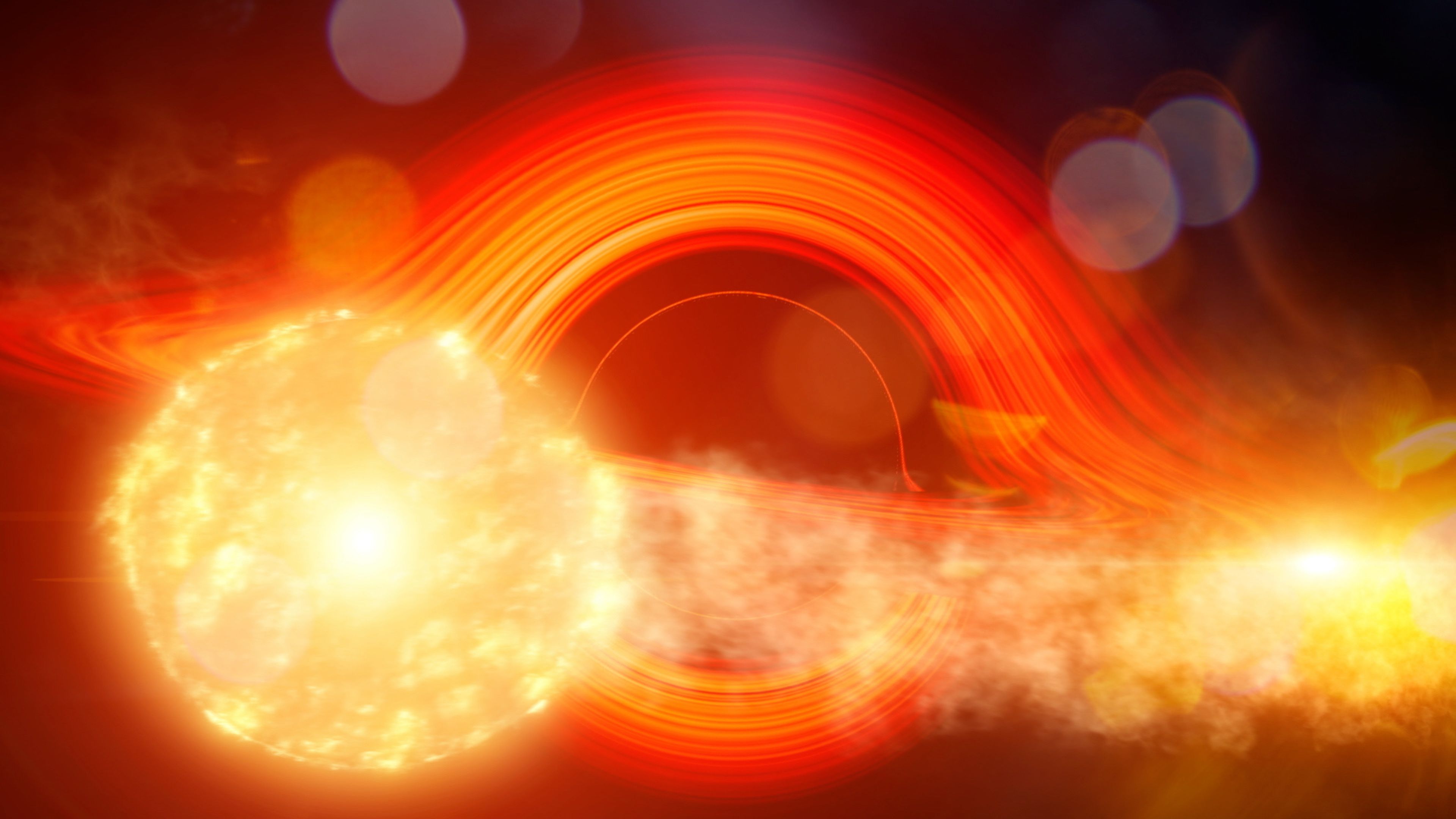 Imagen de la estrella gigante a su paso por el agujero negro supermasivo.