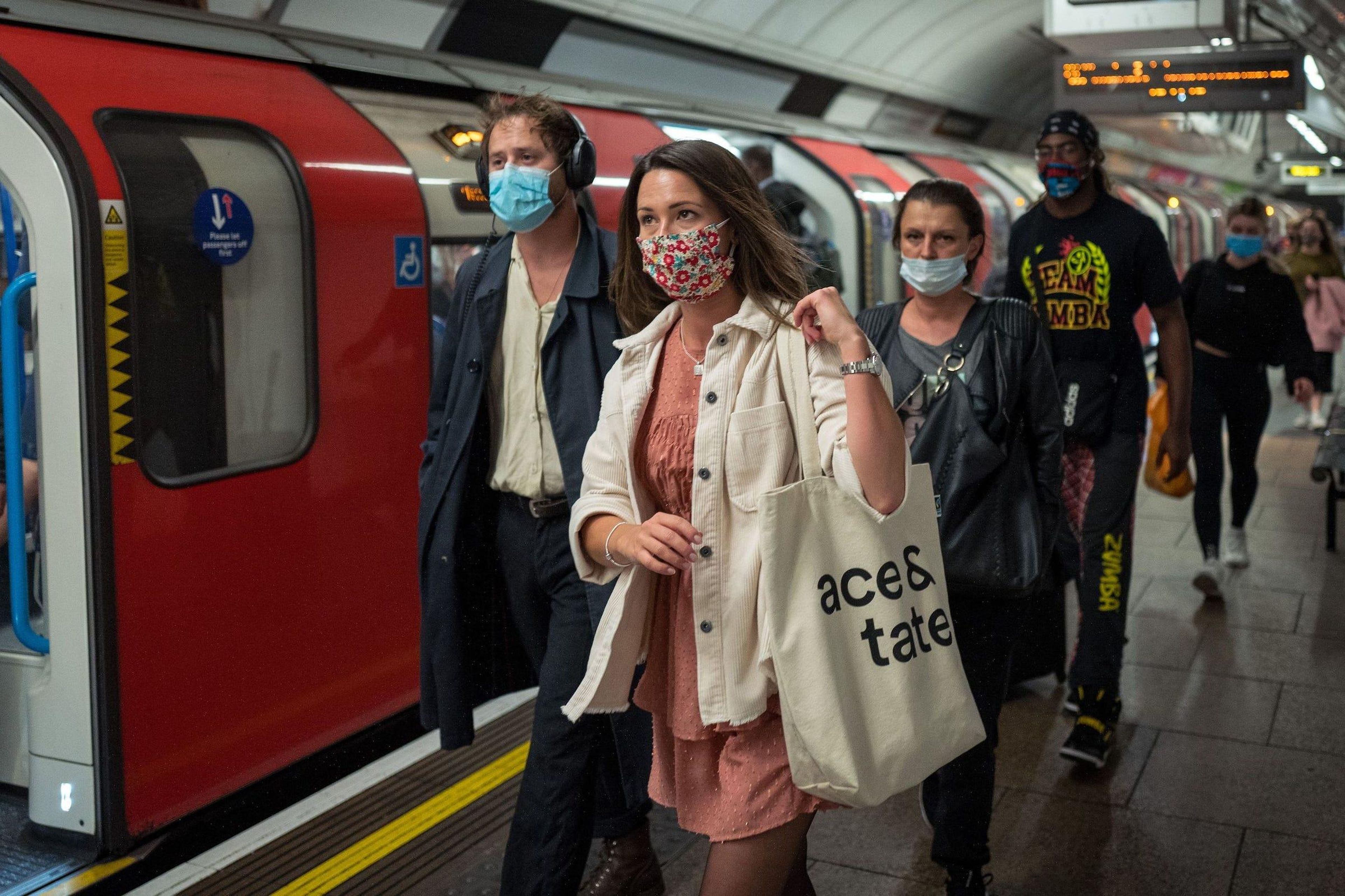 Masked travelers on a London Underground platform, September 24, 2020.