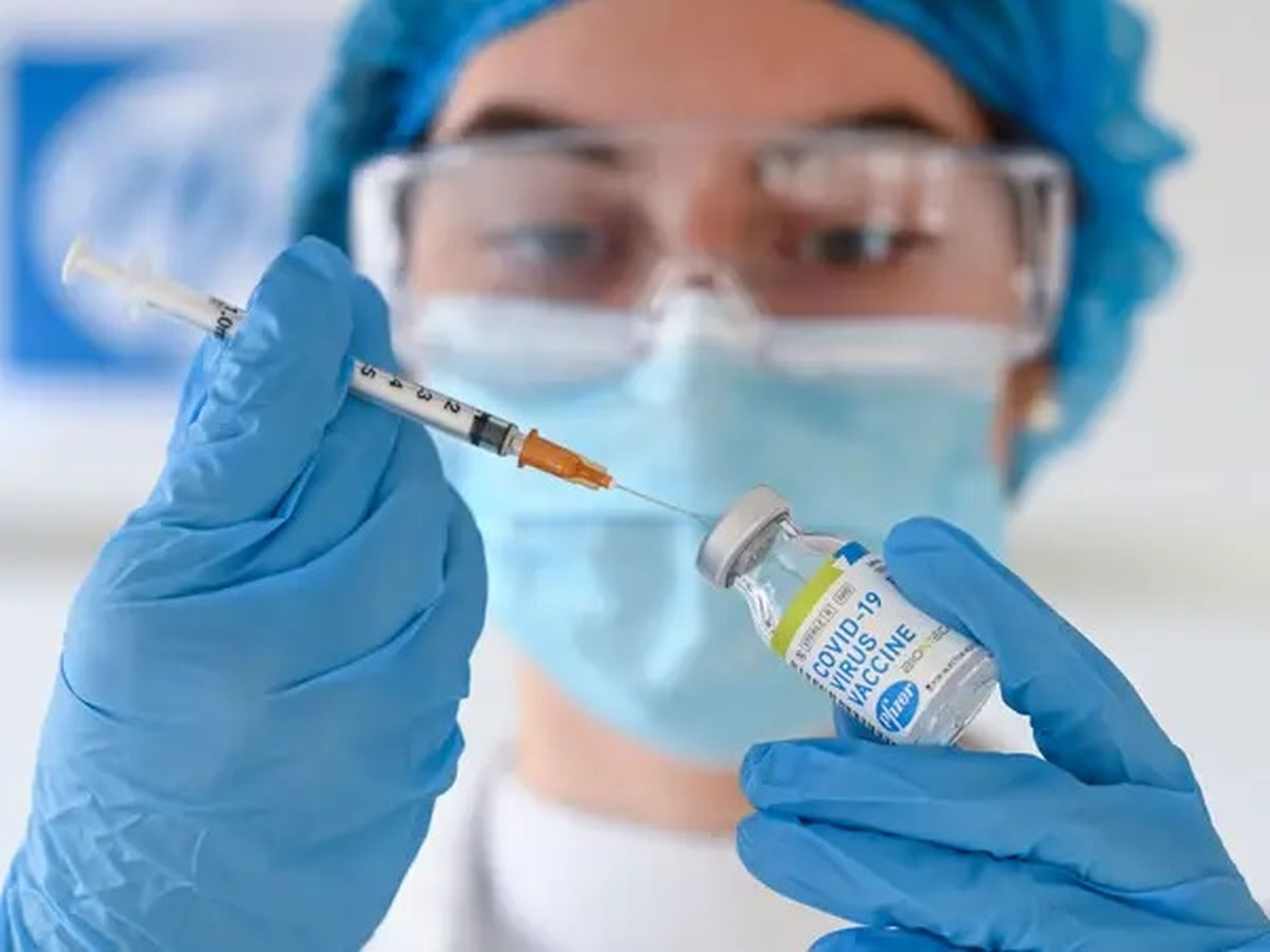 A nurse holds a vial of the Pfizer-BioNTech coronavirus vaccine.